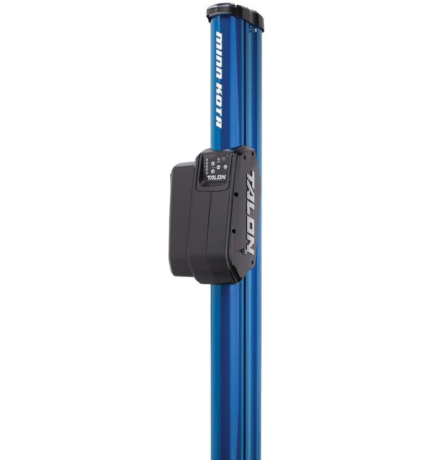 A blue Minn Kota Talon Shallow Water Anchor w/Bluetooth, featuring user-selectable anchoring modes and a black side-mounted control box, is commonly used to secure boats in place.