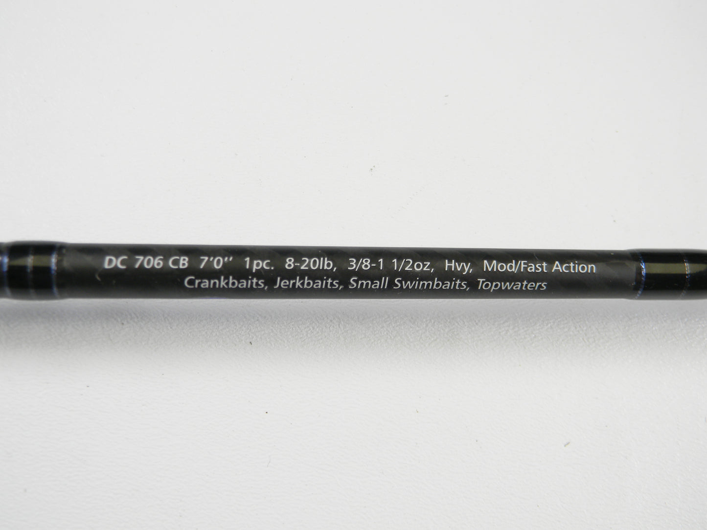 A close-up of the Dobyns Champion XP DC706CB 7'0" Heavy Used Casting Rod in excellent condition with white text showing specs. Great for Rod and Reel Trade-In or earning store credit on used Dobyns gear.