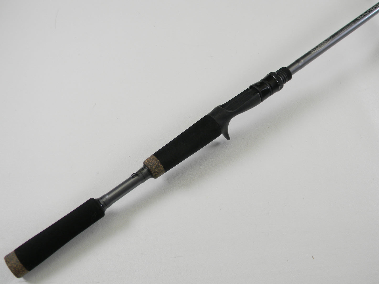 The St. Croix Black Bass RIC73MHF 7'3" Medium Heavy Used Casting Rod, in excellent condition, features a foam grip handle and trigger-style reel seat—ideal for our Rod and Reel Trade-In Program.