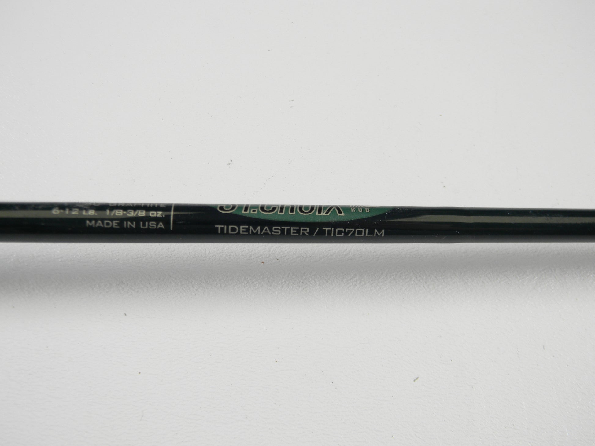 A close-up of a St. Croix Tidemaster TIC70LM 7'0" Light Casting Rod in excellent used condition on a white background—ideal for the Rod and Reel Trade-In Program or earning store credit on used gear.