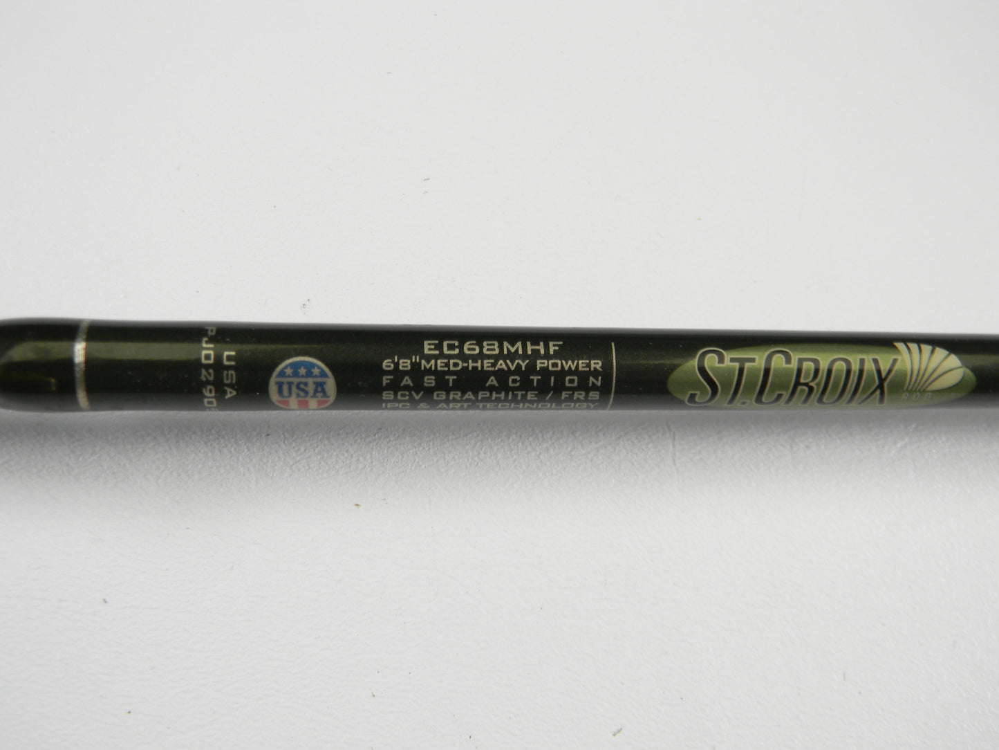 A close-up of the St. Croix Legend Elite EC68MHF 6'8" Medium Heavy Used Casting Rod in very good condition, featuring a USA emblem—perfect for anglers interested in our Rod and Reel Trade-In Program or browsing used gear by St. Croix.