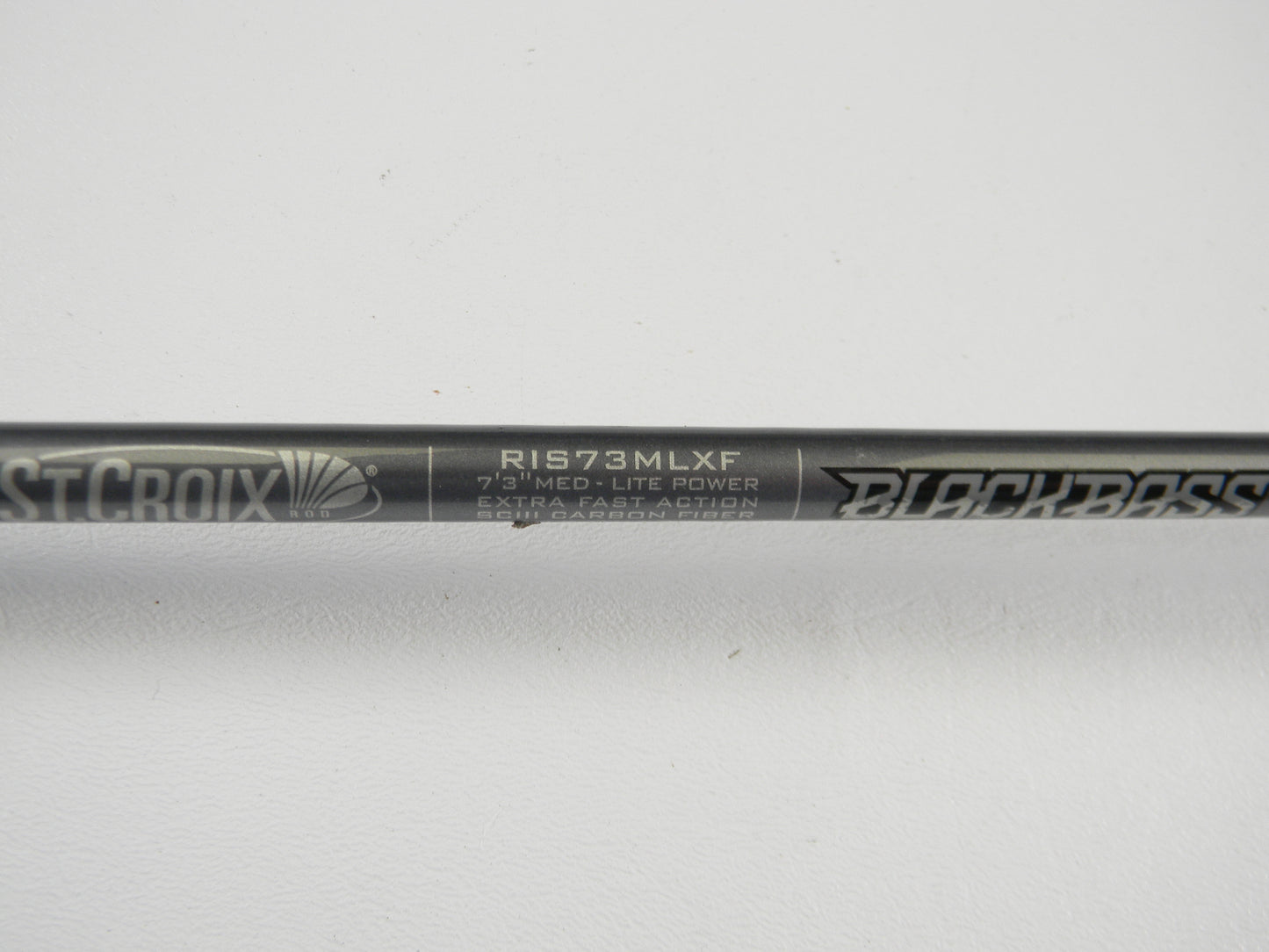 Close-up of the St. Croix Black Bass RIS73MLXF 7'3" Medium Light Used Spinning Rod label—an excellent condition option for the Rod and Reel Trade-In Program if you want quality pre-owned St. Croix gear or store credit.