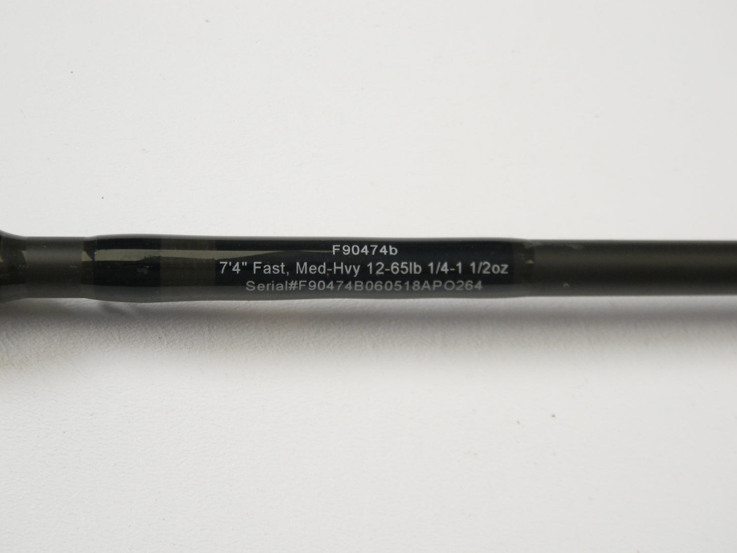 Close-up of the Cashion F90474b rod shows specs: 7'4" fast, med-hvy 12-65lb, 1/4-1 1/2oz; ideal for our Rod and Reel Trade-In program to refresh or trade used gear.