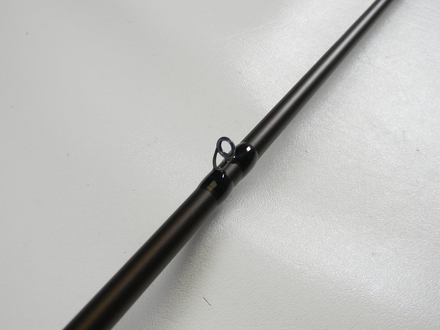 Close-up of a Falcon Lowrider LFC-72HH Flippin Stik 7'2" Heavy casting rod section on a white background, featuring a black guide ring. Ideal for the Rod and Reel Trade-In Program, where used gear like this earns you store credit for your next adventure.