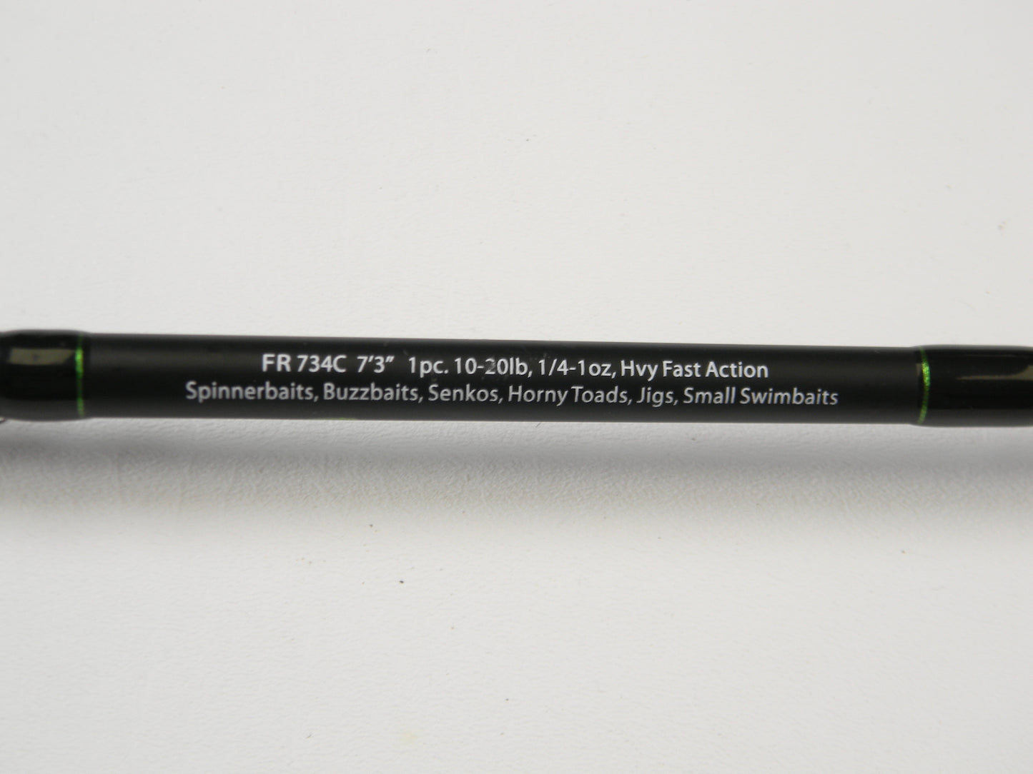 A close-up of the Dobyns Fury FR734C 7'3" Heavy in excellent condition. Perfect for spinnerbaits and jigs, its specs are 1pc, 10-20lb, 1/4-1oz, Hvy Fast Action. Upgrade using our Rod and Reel Trade-In Program to earn store credit toward new or used gear.