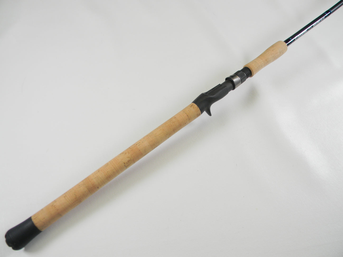The G. Loomis IMX-PRO Blue 845C M 7'0" Heavy Used Casting Rod, in excellent condition, is ideal for our Rod and Reel Trade-In Program—trade it in for store credit today!.