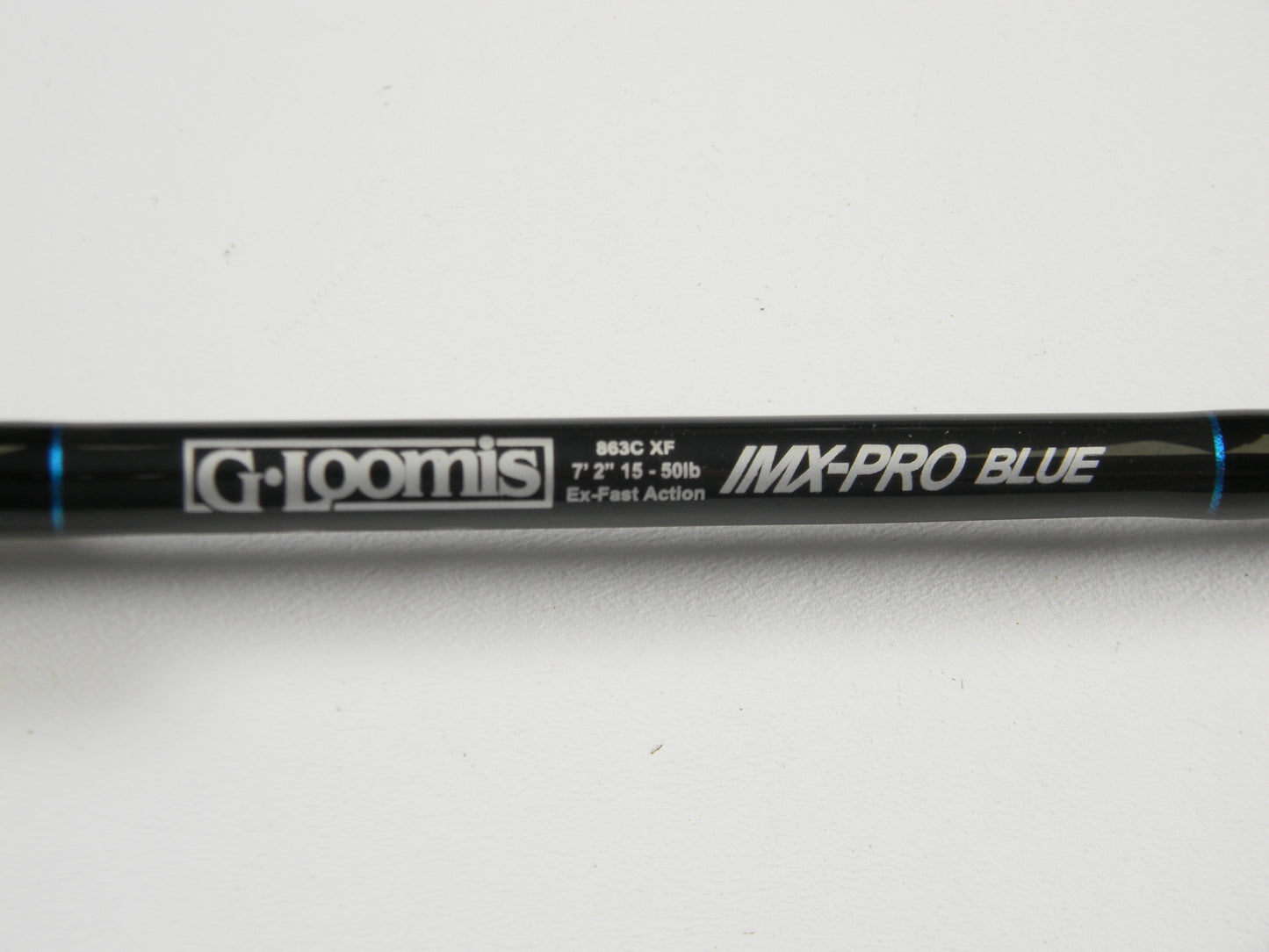 Close-up of a G. Loomis IMX-PRO BLUE 863C XF 7'2" Medium Used Casting Rod in very good condition. Trade in your used G. Loomis gear for store credit with our Rod and Reel Trade-In Program.