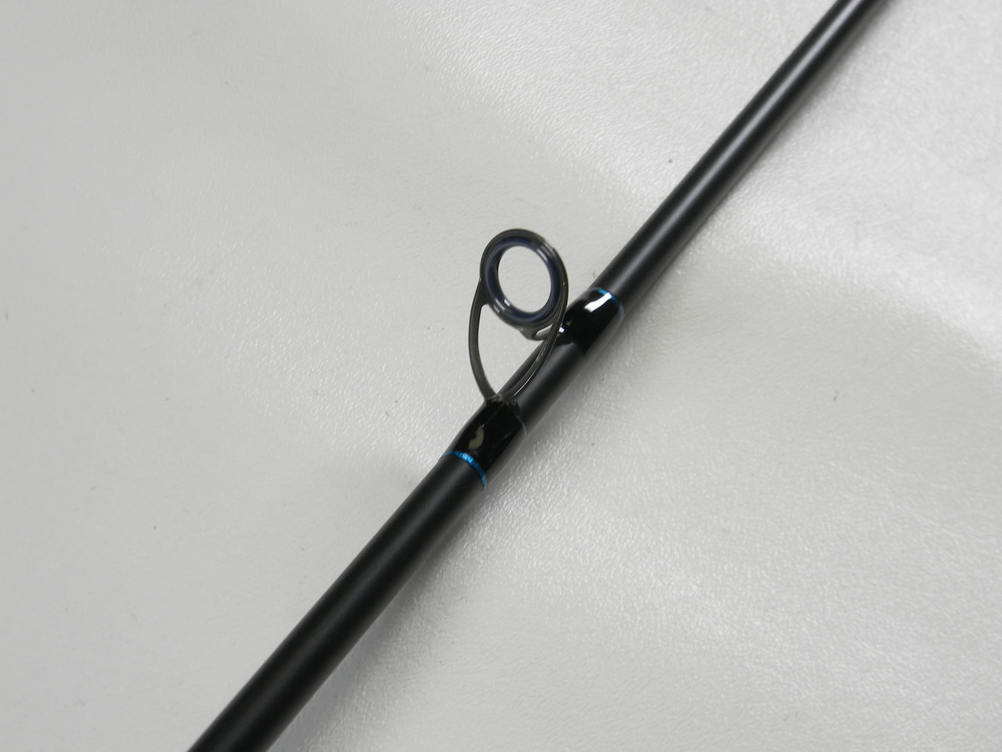 Close-up of a G. Loomis IMX-PRO BLUE 863C XF 7'2" Medium Used Casting Rod in very good condition—ideal for fans of quality used gear or our Rod and Reel Trade-In Program.