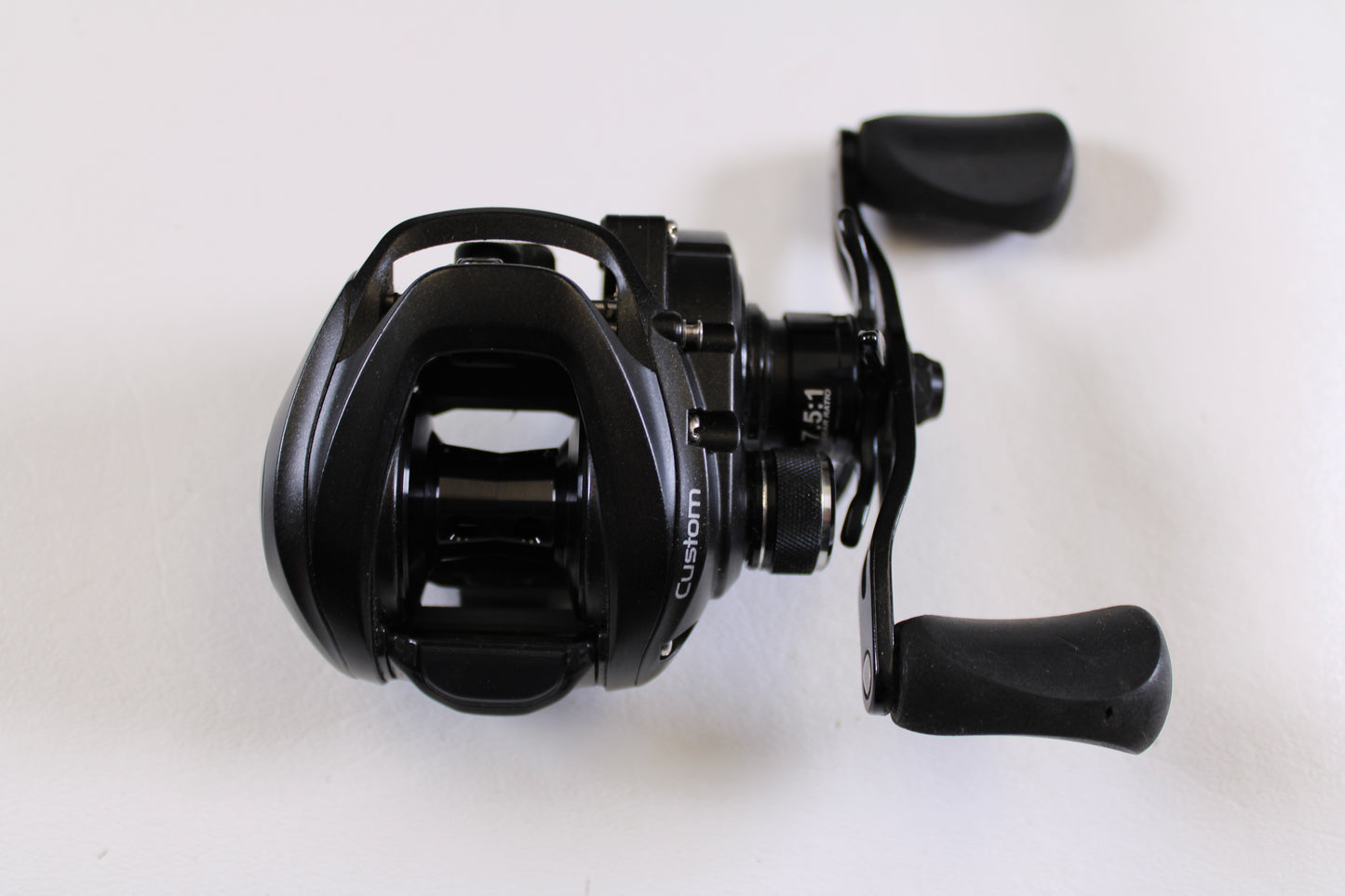 Upgrade with our Rod and Reel Trade-In Program or buy quality used gear like the Lew's Custom Speed Spool SLP CU1SH 7.5:1 RH—an excellent condition casting reel with ergonomic handles and visible spool, perfect for your next fishing trip.