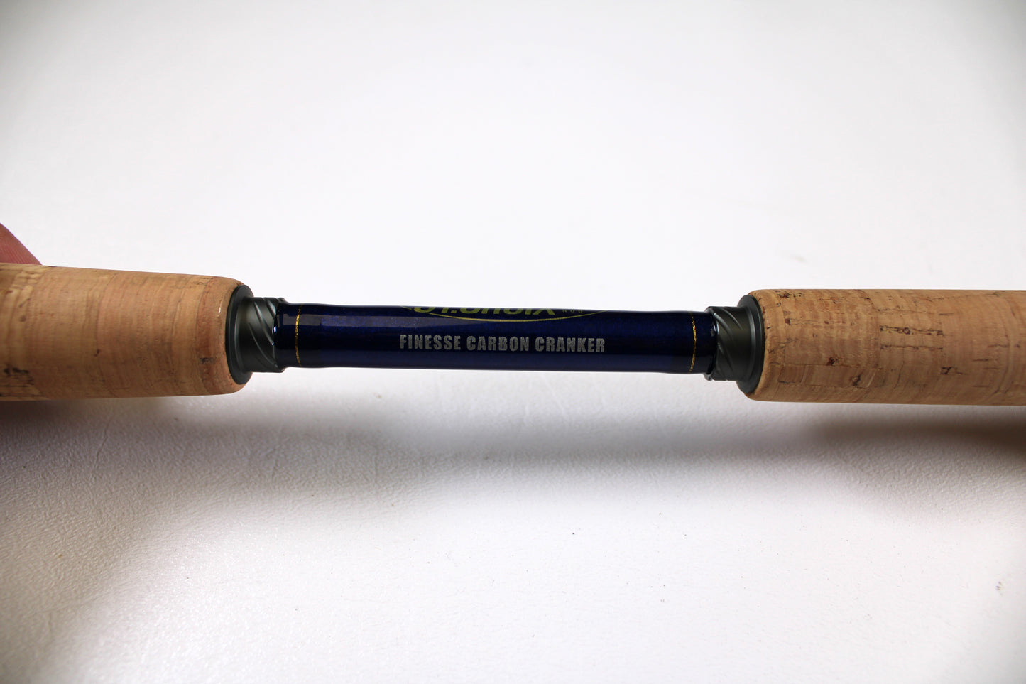 A close-up of the St. Croix Legend Tournament Bass LBTC72MHMF Finesse Carbon Cranker 7'2" Medium Heavy Used Casting Rod—excellent condition, cork grips, and ideal for our Rod and Reel Trade-In Program if you want to update your gear.