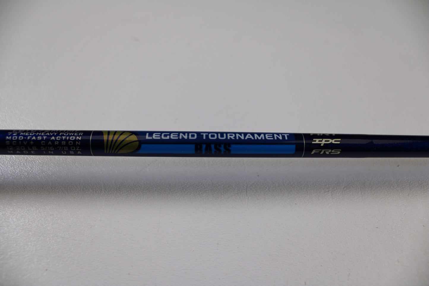 A close-up of a St. Croix Legend Tournament Bass LBTC72MHMF Finesse Carbon Cranker 7'2" Medium Heavy Casting Rod in excellent condition—perfect for the Rod and Reel Trade-In Program to earn store credit for your next purchase.