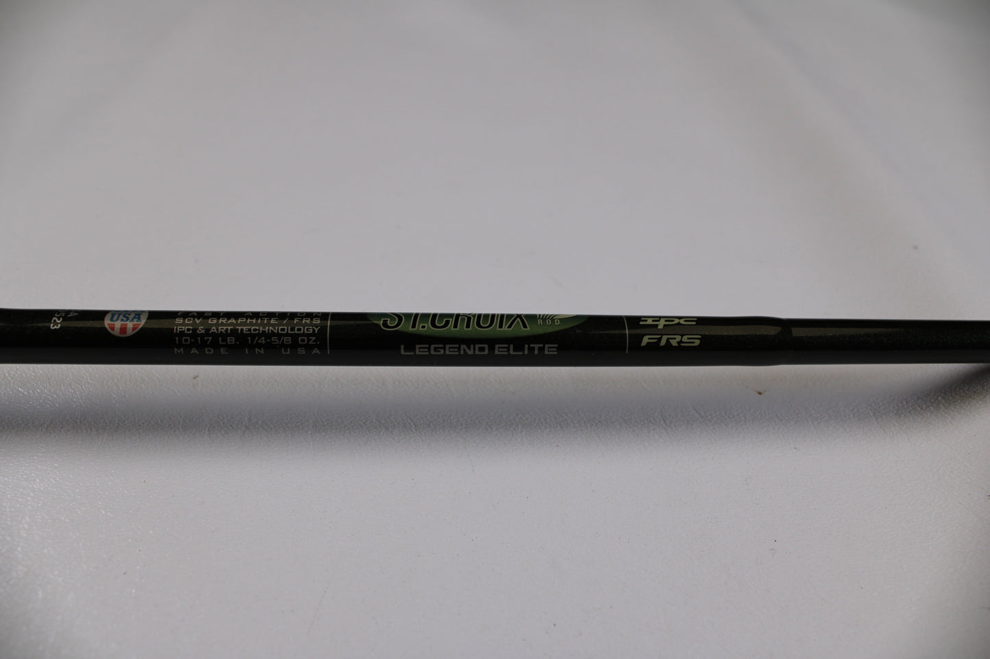 A close-up of the St. Croix Legend Elite EC70MF 7'0" Medium Used Casting Rod in excellent condition, featuring SCV graphite, IPC tech, and "Made in USA." Trade-in your gear for store credit with our Rod and Reel Trade-In Program.