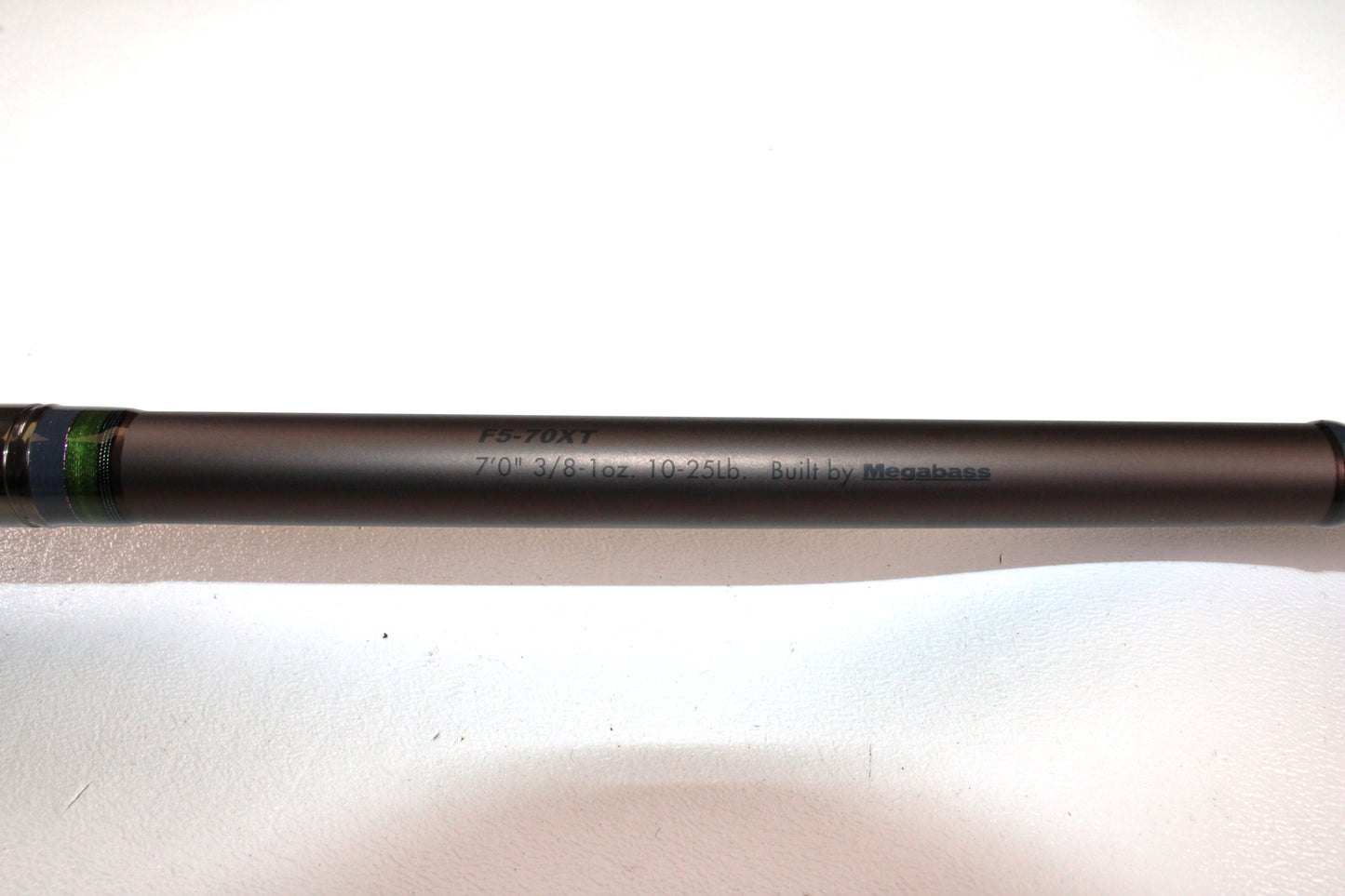 A close-up of the Megabass Orochi X10 F5-70XT Bandersnatch 7'0" Medium used casting rod in excellent condition—ideal for our Rod and Reel Trade-In Program or store credit on used gear.
