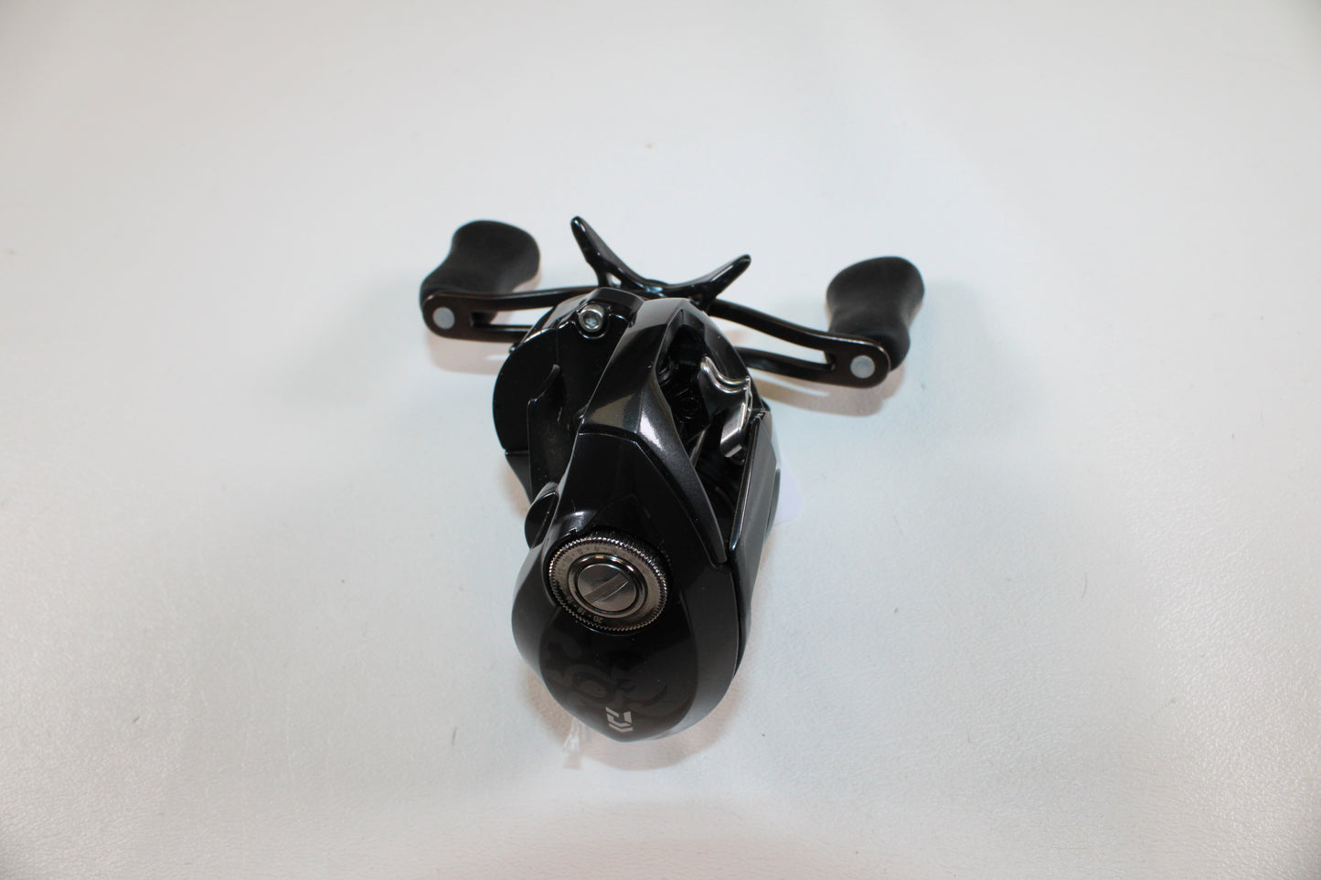A Daiwa Tatula SV 70 TTUSV70XH Used Casting Reel in excellent condition, shown from the front with dual handles—ideal for upgrading through our Rod and Reel Trade-In Program or buying quality used Daiwa gear with store credit.