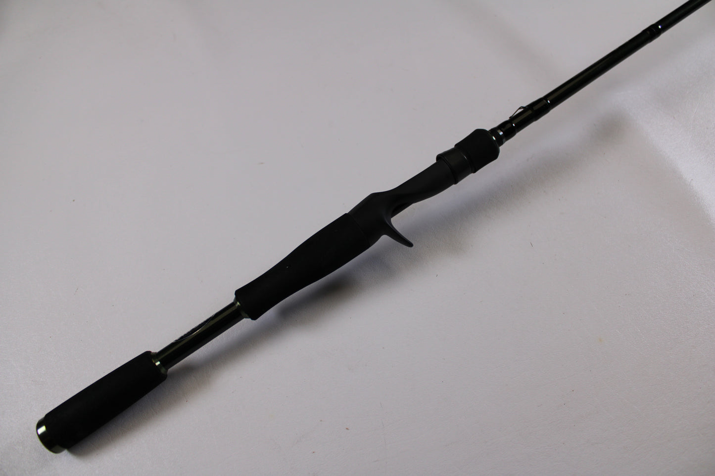 The Evergreen Combat Stick RCTC-68M, a used casting rod in excellent condition, features a split handle and trigger grip—perfect for upgrades through our Rod and Reel Trade-In Program.