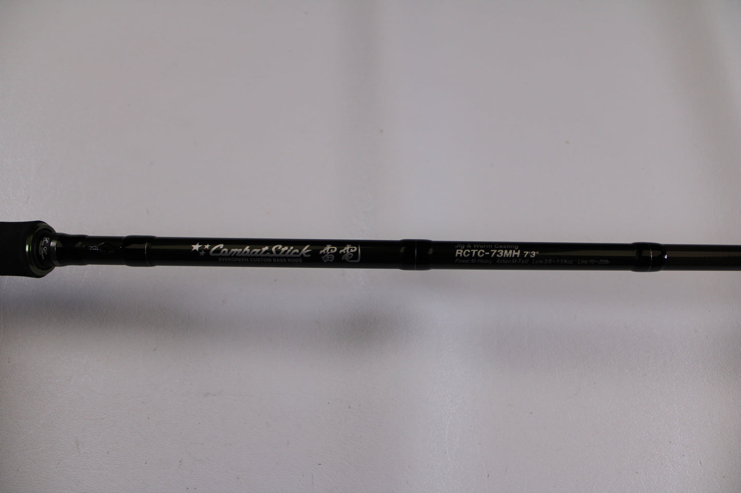 A close-up of the Evergreen Combat Stick RCTC-73MH used casting rod in excellent condition—a great choice for our Rod and Reel Trade-In Program if you're seeking store credit on quality pre-owned Evergreen gear.