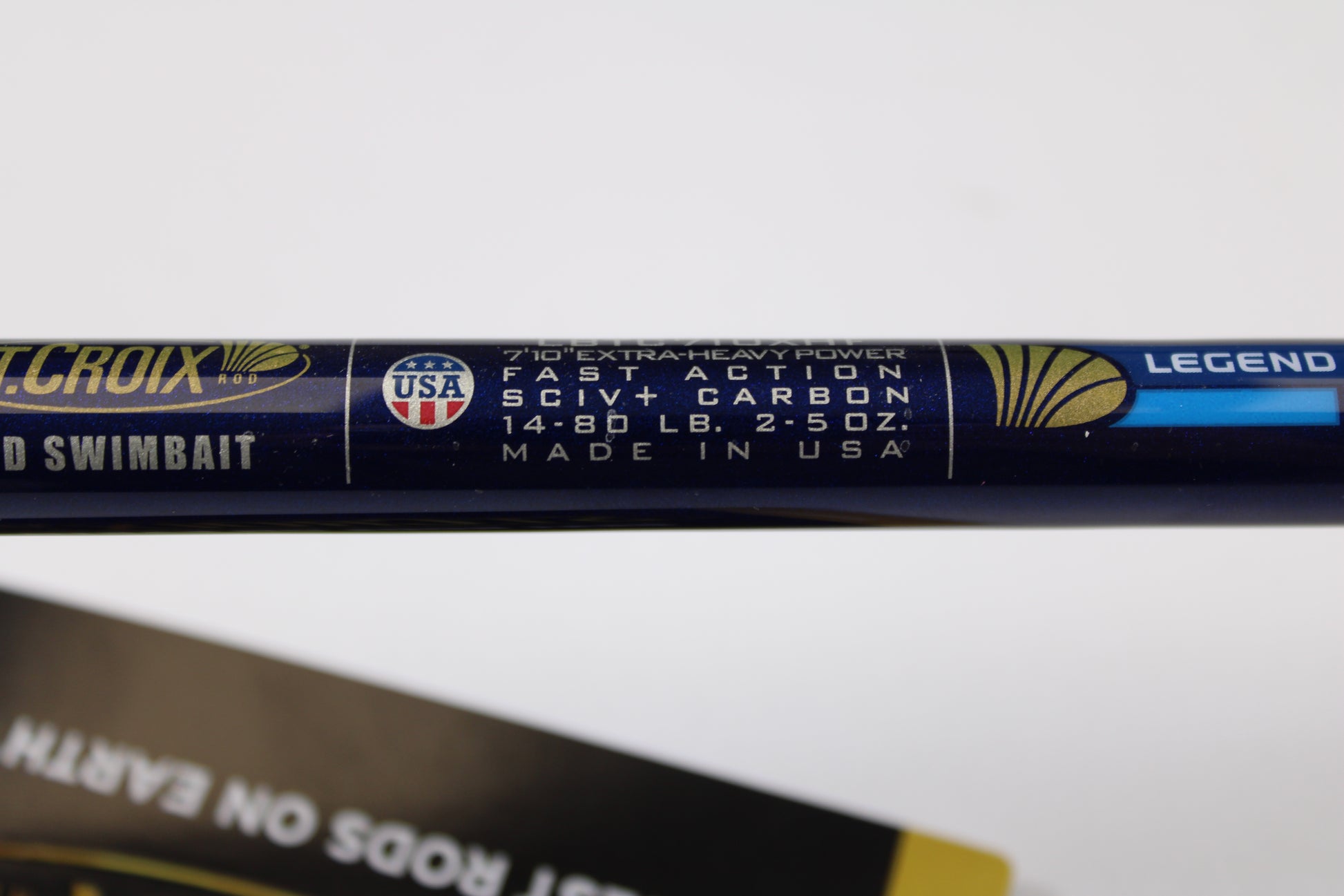 Close-up of St. Croix Legend Tournament Bass LBTC710XHF Mid Swimbait 7'10" XH—shows "Extra-Heavy Power, Fast Action, SCIV+ Carbon, 14-80 lb, 2-5 oz, Made in USA" with flag and "Legend"; ideal for trade-in or used gear store credit.