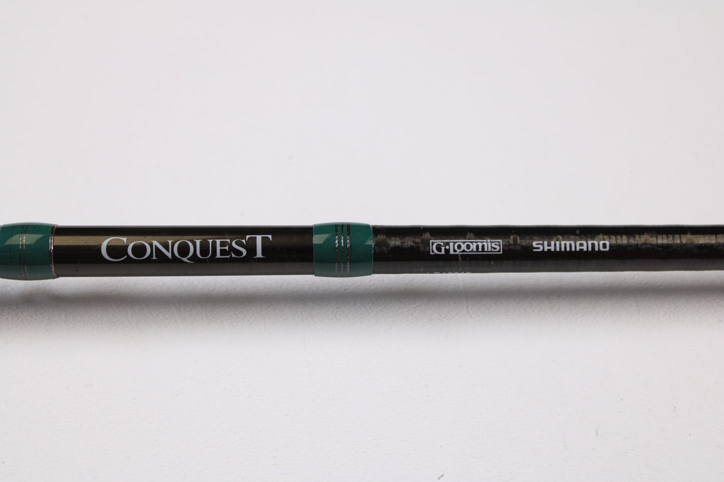A close-up of the G. Loomis Conquest CNQ 783C MBR 6'6" Medium Heavy Used Casting Rod in excellent condition, ideal for anglers exploring our Rod and Reel Trade-In Program or searching for premium used gear.