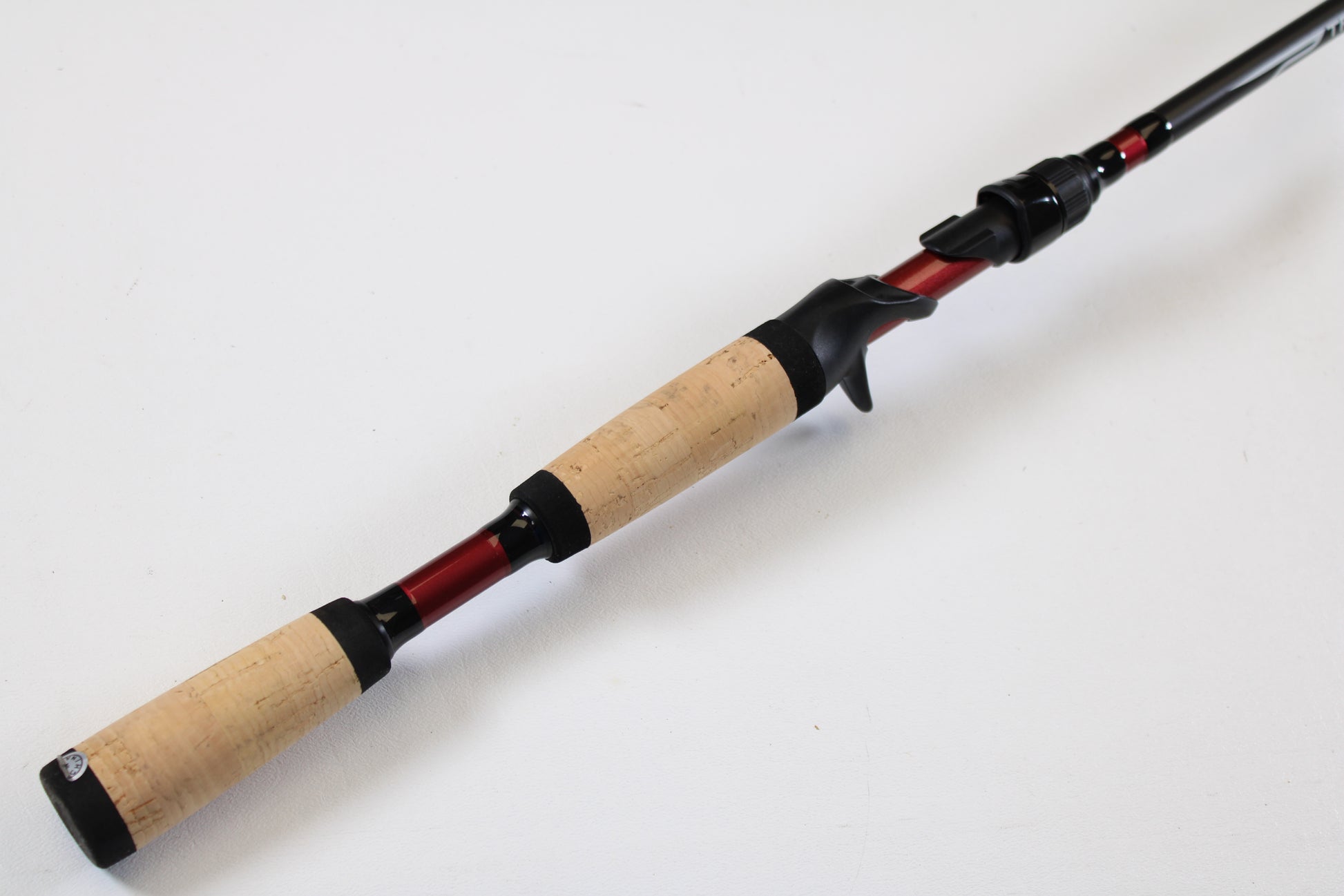 A close-up of the Temple Fork TFO Tactical Bass TACSB7051-3 7'0" Medium Heavy casting rod in excellent used condition—ideal for those trading used gear through our Rod and Reel Trade-In Program for store credit.