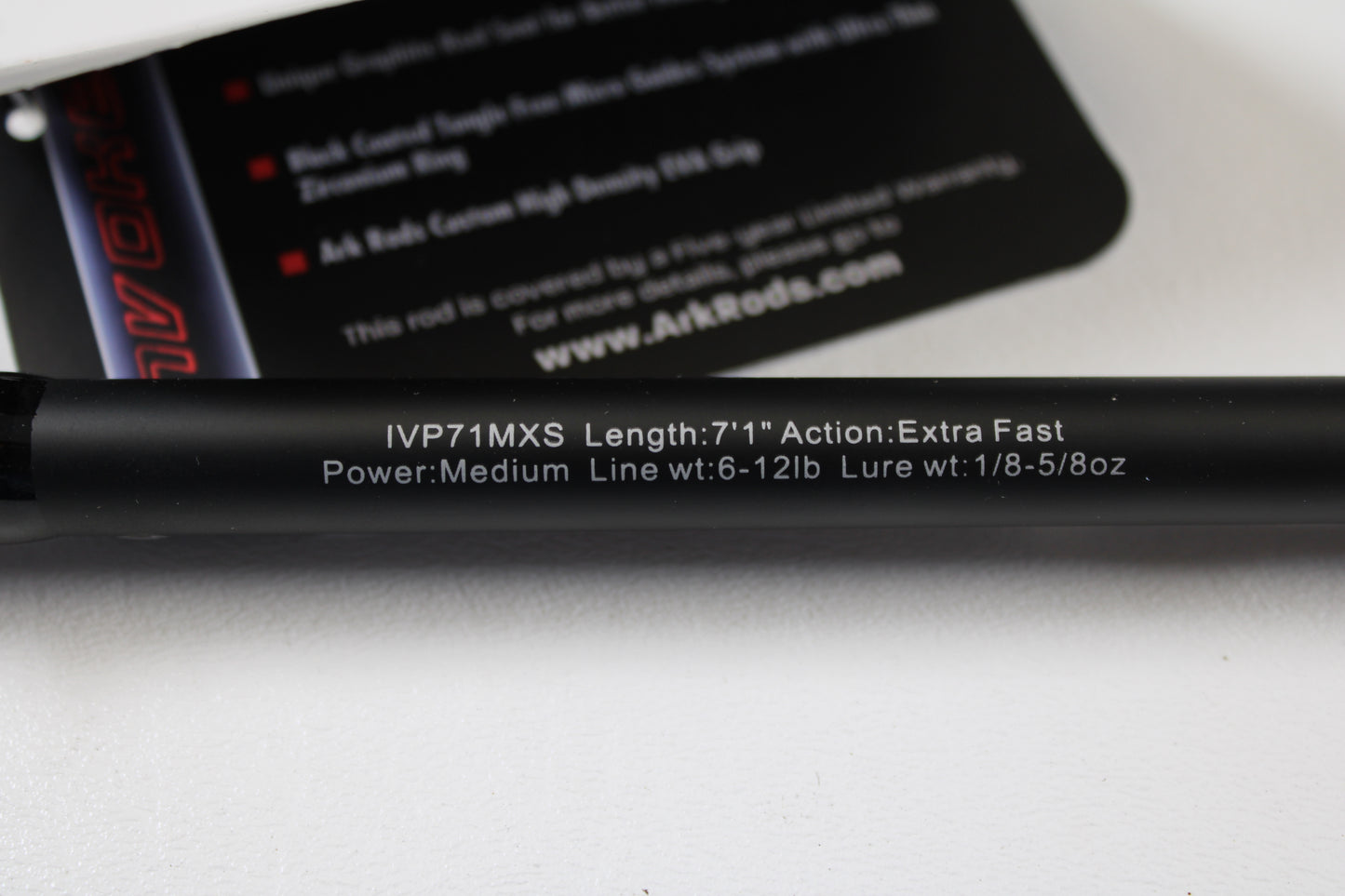 A close-up of the Ark Fishing Invoker Pro IVP71MXS 7'1" Medium Used Spinning Rod (Extra Fast Action, 6-12 lb line, 1/8-5/8 oz lure) in excellent condition—ideal for your next rod and reel trade-in for store credit.