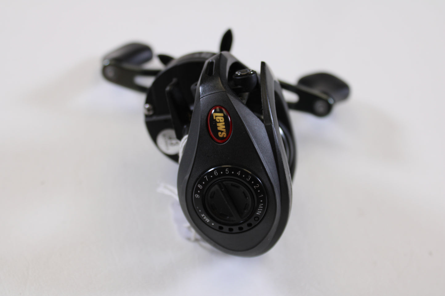 A Lew's Speed Spool SS1SA 5.6:1 RH used casting reel in very good condition is displayed on a white background, brand logo and adjustable dial visible—ideal for anglers upgrading via the Rod and Reel Trade-In Program.