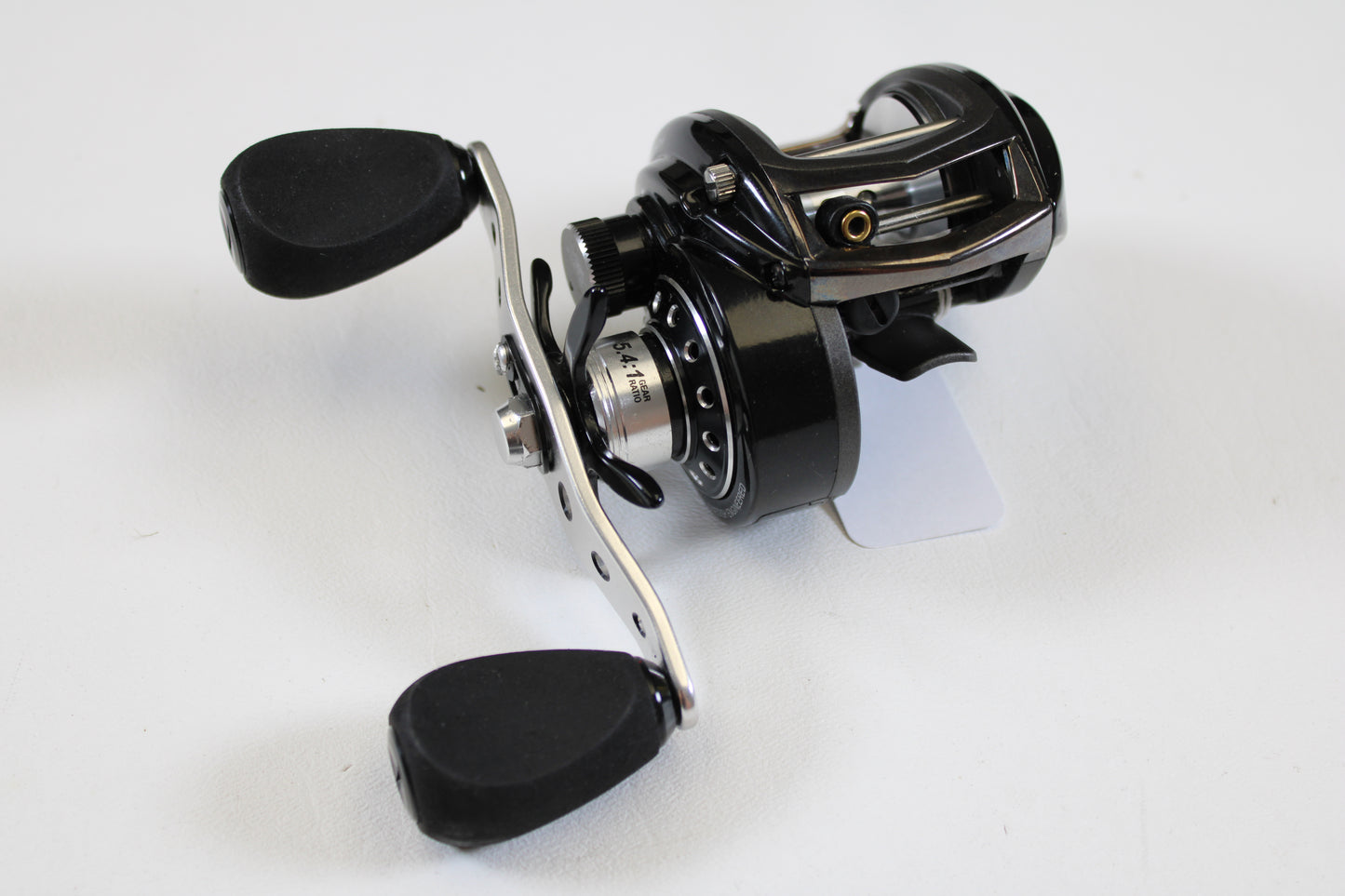 An Abu Garcia Revo Winch Gen 3 RVO3 WNCH 5.4:1 RH used casting reel in excellent condition is displayed on a white background—ideal for anglers upgrading through our rod and reel trade-in program for store credit.