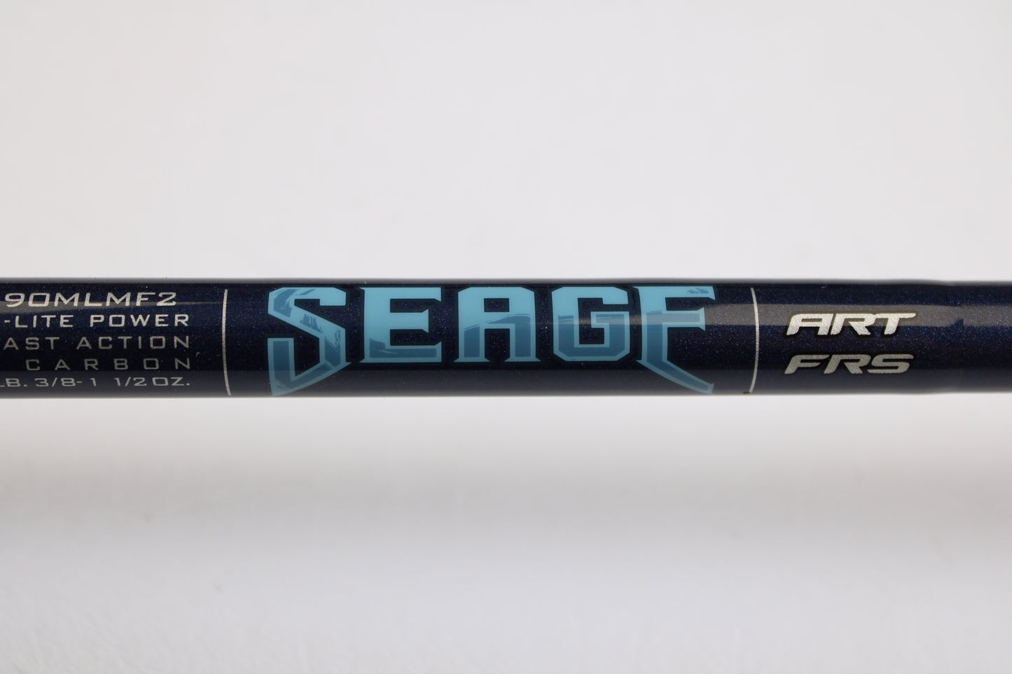 A close-up of the St. Croix Seage SES90MLMF2 9'0" Medium Light 2 Piece Used Spinning Rod in excellent condition, showing bold "SEAGE" lettering and specs—perfect for our Rod and Reel Trade-In Program.