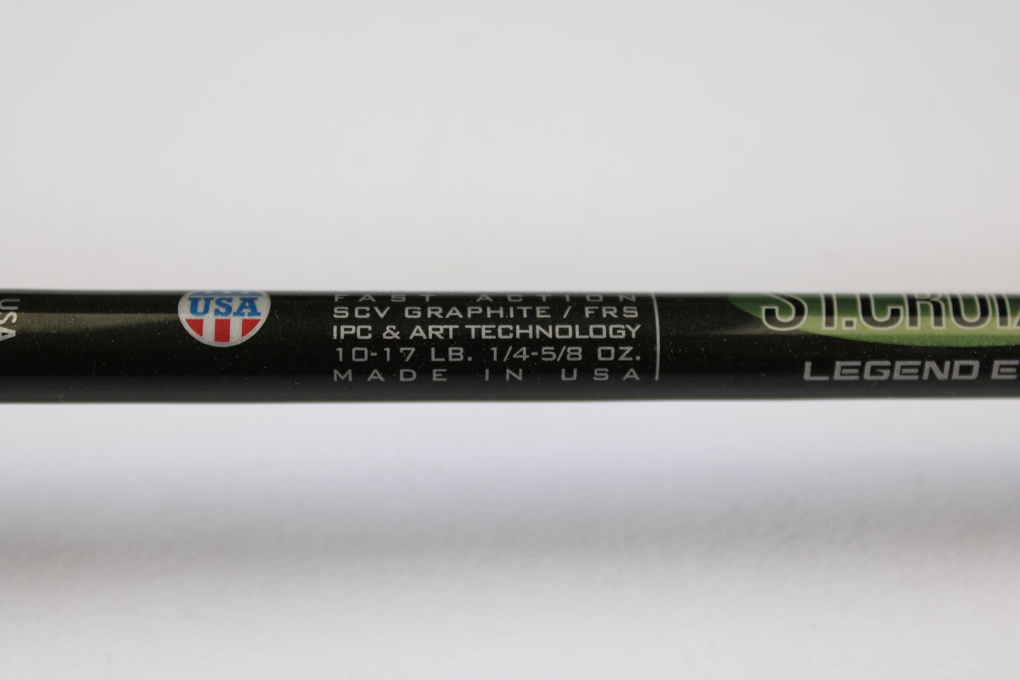 Close-up of a St. Croix Legend Elite EC70MF 7'0" Medium Used Casting Rod showing "SCV graphite/FRS, IPC & ART tech, 10-17 LB, 1/4-5/8 oz., Made in USA" with a USA flag emblem. Eligible for our Rod and Reel Trade-In Program for store credit.