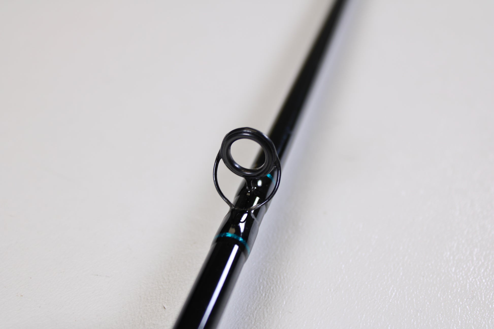 A close-up view of the St. Croix Premier PC66MF 6'6" Medium Used Casting Rod in excellent condition, focusing on a line guide—ideal for anglers interested in quality used St. Croix gear or considering a rod trade-in.