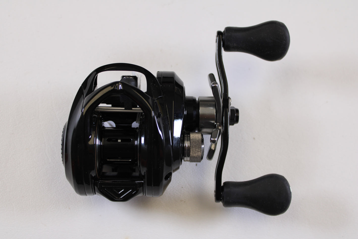 The Florida Fishing Products Bahia BC 150 7.2:1 RH—Used Spinning Reel in excellent condition, shown from above on a white background, is eligible for our Rod and Reel Trade-In program when you upgrade to new or used gear.