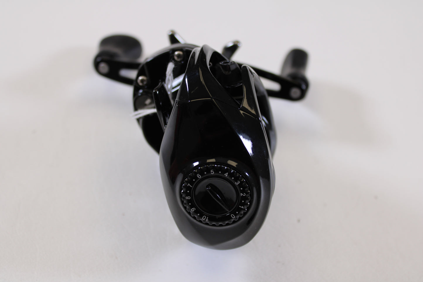 A close-up of the Florida Fishing Products Bahia BC 150 7.2:1 RH spinning reel in excellent used condition on a white background—ideal for our rod and reel trade-in program to help you upgrade and earn store credit.