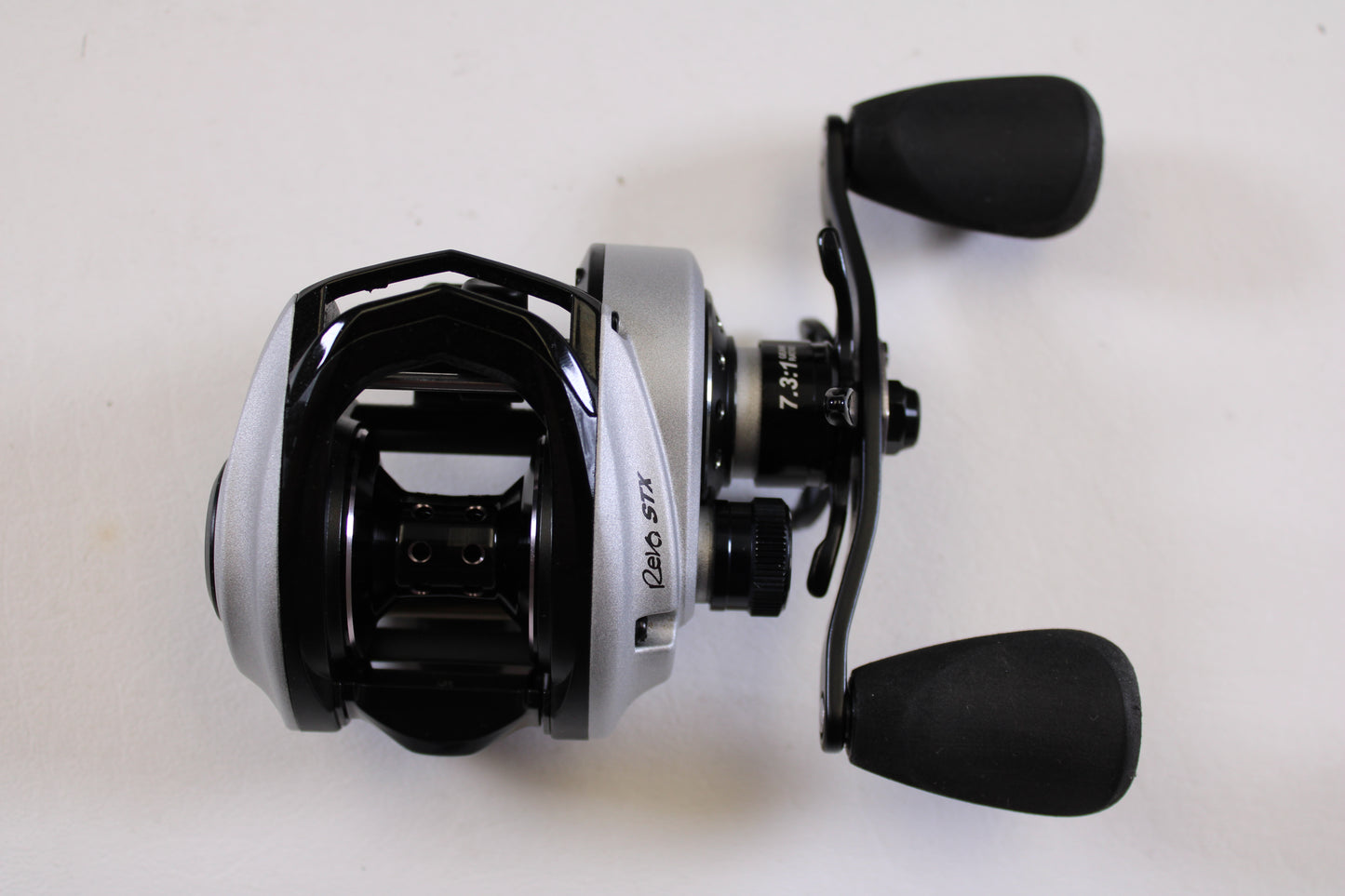 A close-up of the Abu Garcia Revo STX Gen 4 REVO3STX-HS 7.3:1 RH used casting reel in excellent condition—ideal for upgrading through our rod and reel trade-in program or earning store credit for your used gear.