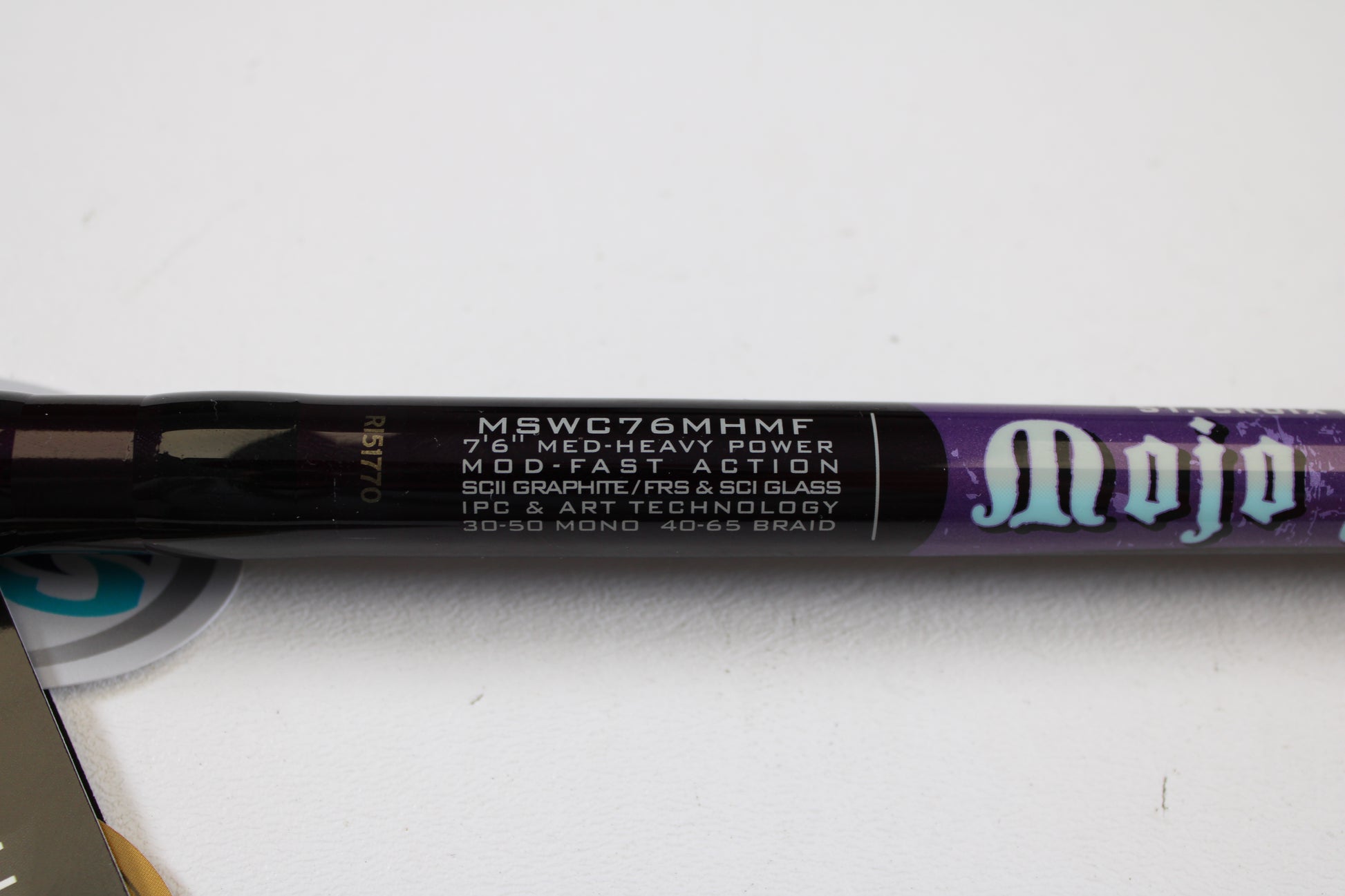 A close-up of a St. Croix Mojo Salt MSWC76MHMF 7’6” Medium Heavy Used Casting Rod in mint condition—ideal for our Rod and Reel Trade-In Program or to earn store credit on used St. Croix gear.