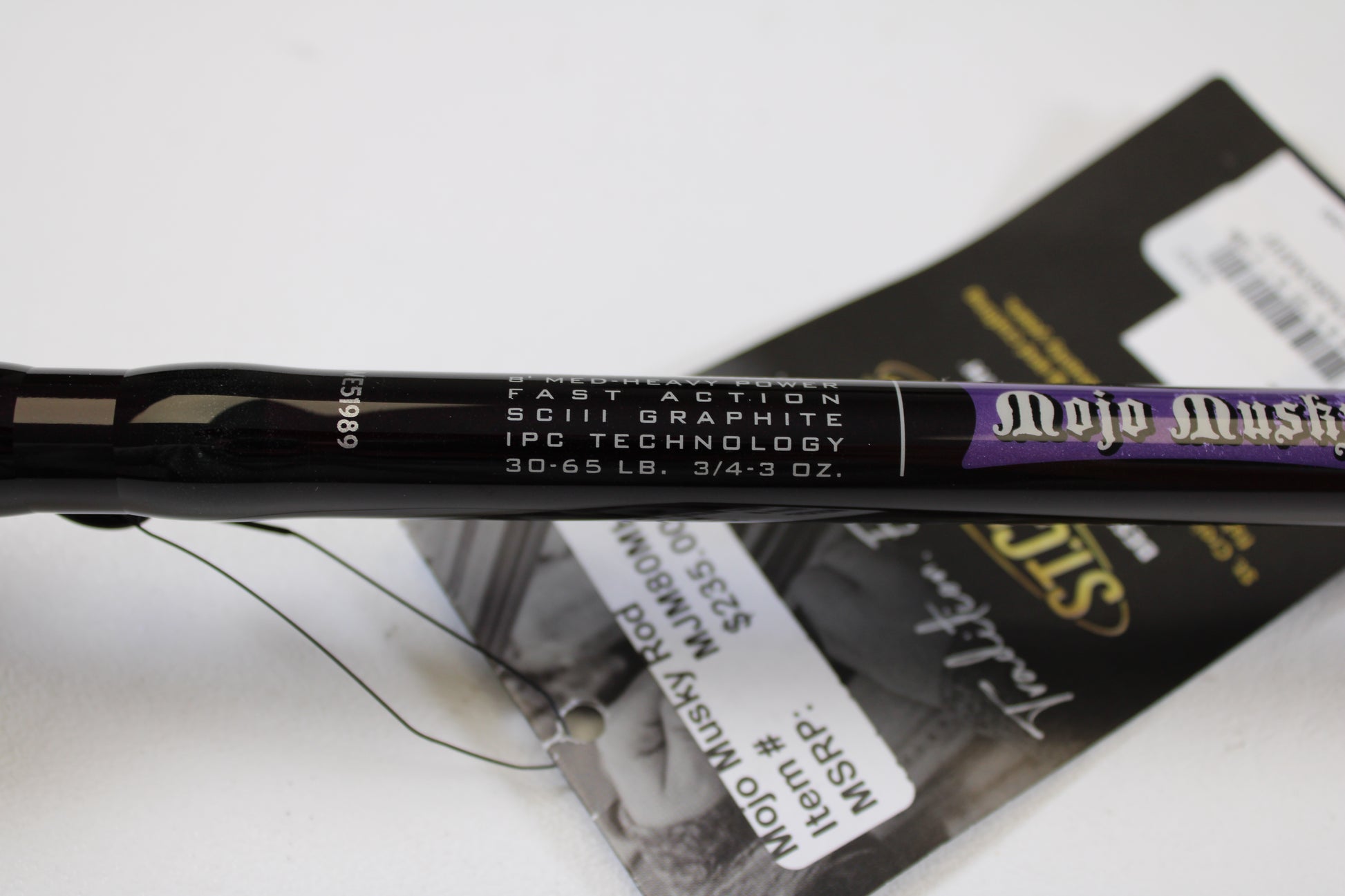 Close-up of a St. Croix Mojo Musky MJM80MHF 8'0" Medium Heavy used casting rod in mint condition, showing fast action SCIII graphite and IPC tech—ideal for our Rod and Reel Trade-In Program if you want store credit on used gear.