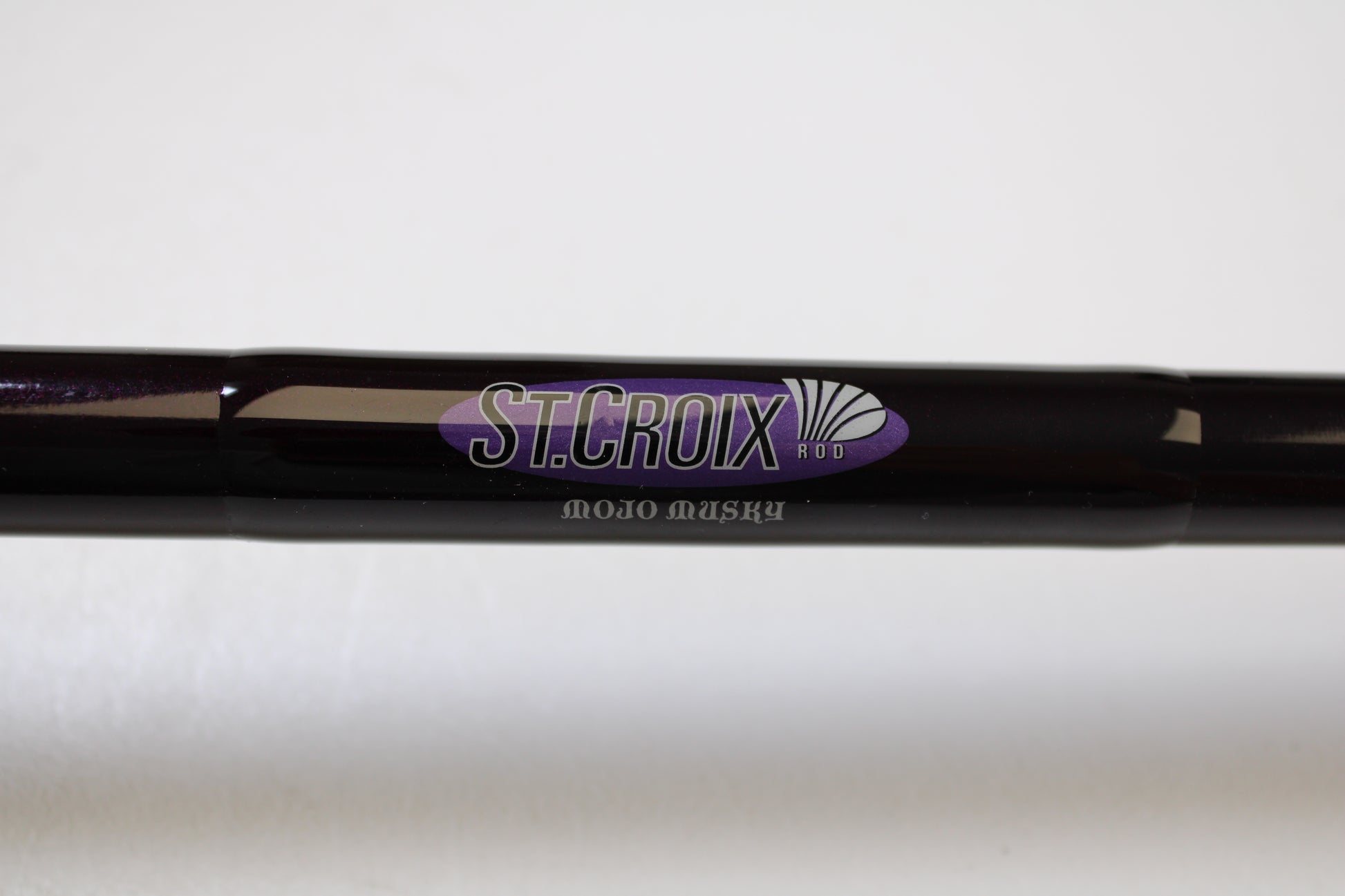 Close-up of a St. Croix Mojo Musky MJM80MHF 8'0" Medium Heavy Used Casting Rod in mint condition—ideal for anglers upgrading with our Rod and Reel Trade-In Program.