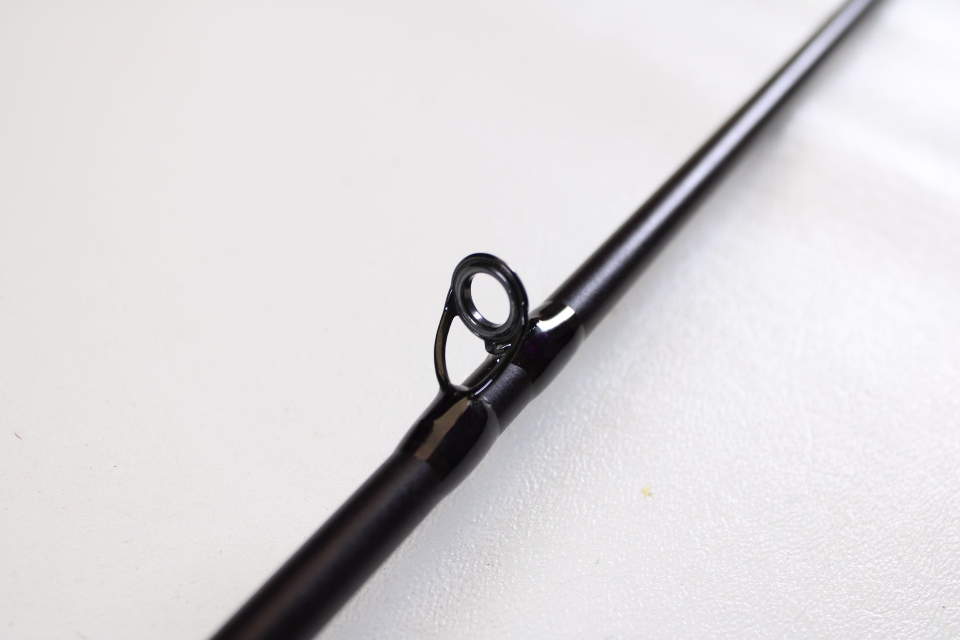 A close-up of the St. Croix Mojo Bass JOC72MHMF 7'2" Medium Heavy Used Casting Rod in excellent condition shows a single line guide ring—ideal for anglers trading in gear or upgrading with the Rod and Reel Trade-In Program.