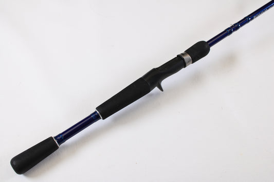 A close-up of the Douglas LRS C704M 7'0" Medium used casting rod in very good condition, with a black handle and blue shaft, shown on a white background. Eligible for our Rod and Reel Trade-In Program for store credit.