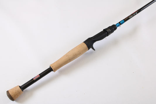 A close-up of the Jewel Virtus Stickbait 6'8" Medium Used Casting Rod in excellent condition, featuring a cork handle and black reel seat—ideal for upgrades with our Rod and Reel Trade-In Program.