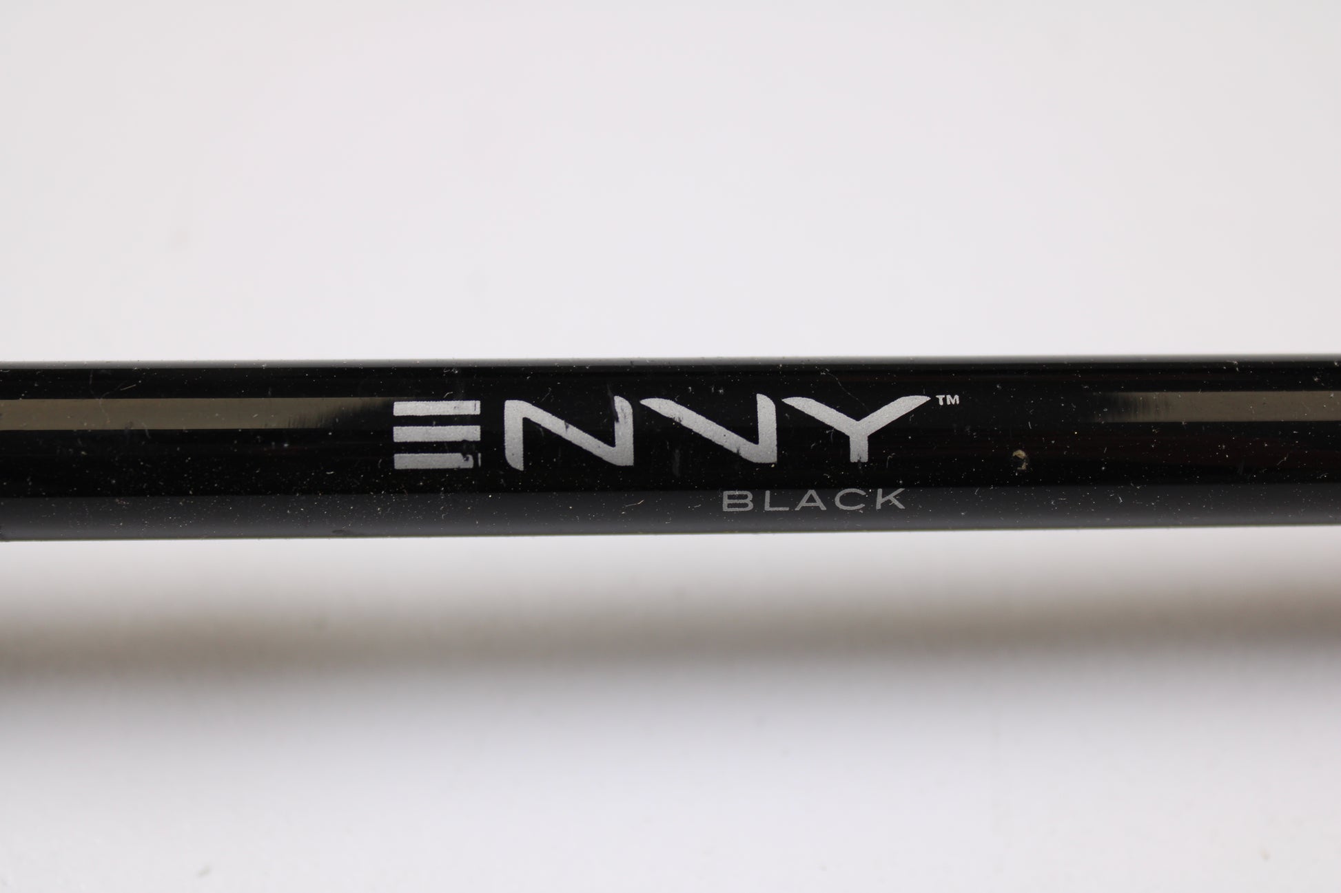 A close-up of a 13 Fishing Envy Black EBC76H 7'6" Heavy Used Casting Rod in very good condition—ideal for anglers upgrading gear through our Rod and Reel Trade-In Program for store credit.