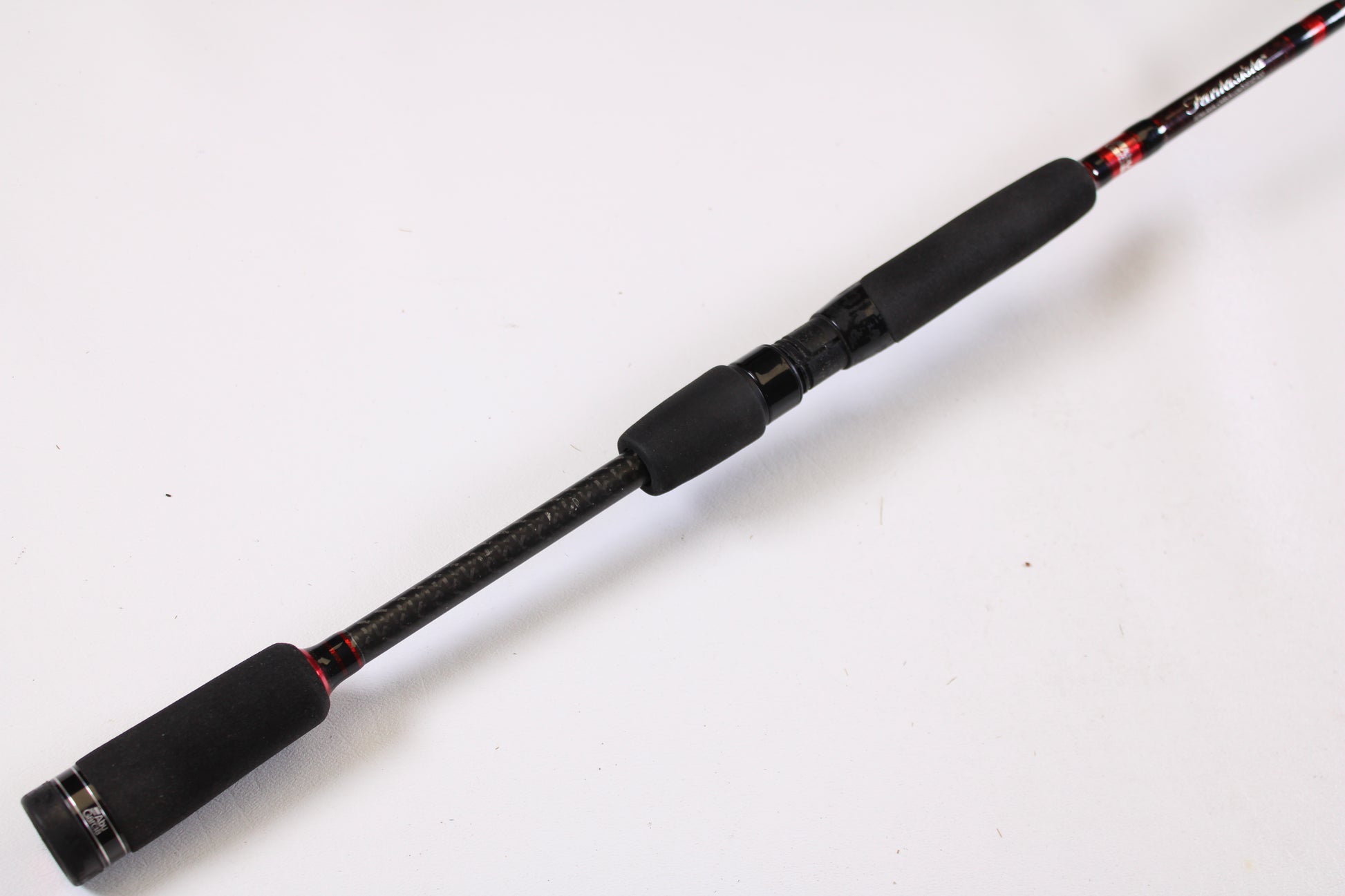 A close-up of the Abu Garcia Fantasista Regista FNRS70-5 7'0" Medium Used Spinning Rod in very good condition—ideal for anglers interested in our Rod and Reel Trade-In Program to exchange used gear for store credit.