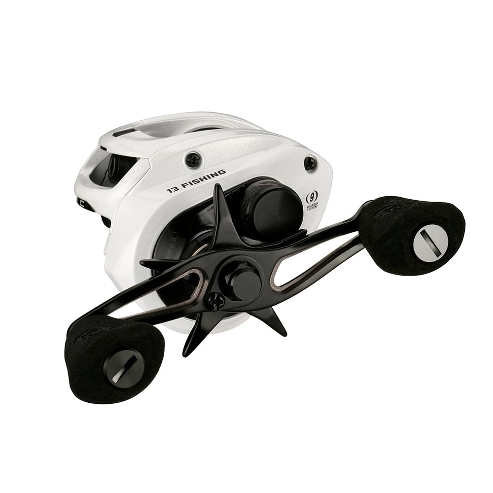 The 13 Fishing Concept C2 Casting Reel Left Hand 7.5:1 (C2-7.5-LH) by 13 Fishing is shown in white with black foam-grip handles, designed for left-handed use, displayed against a white background.