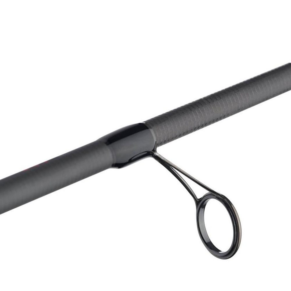The close-up image of an Abu Garcia Veritas Tournament Spinning Rod 7'0" Medium Heavy (VXTS70-6) showcases a sleek black guide with a circular metal ring on the carbon fiber rod, enhanced by Powerlux 200 technology for smooth line direction.