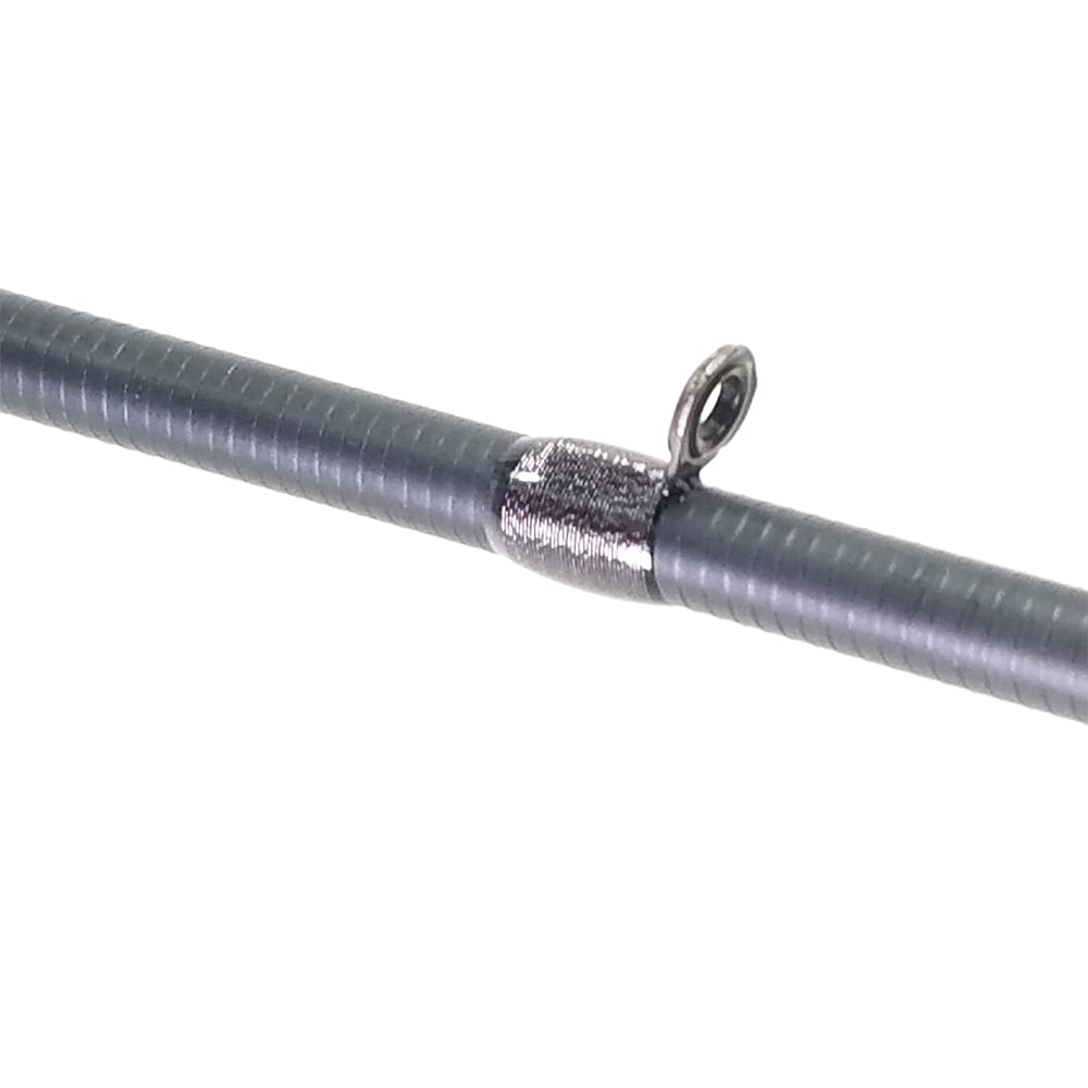 The ALX ENOX Casting Rod Hunch 7'0" Medium (E28430FC) features a metallic guide ring on its sleek black ribbed Toray carbon fiber body, securely wrapped against a plain white backdrop.