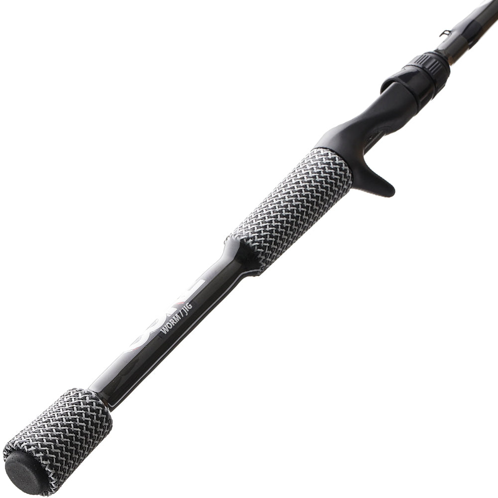 A close-up of the Cashion Rods CORE Series Casting Rod Worm Jig 7'0" Medium (CM8427) handle, featuring a textured black and white grip and trigger-style reel seat, highlights its medium action design on a white background.