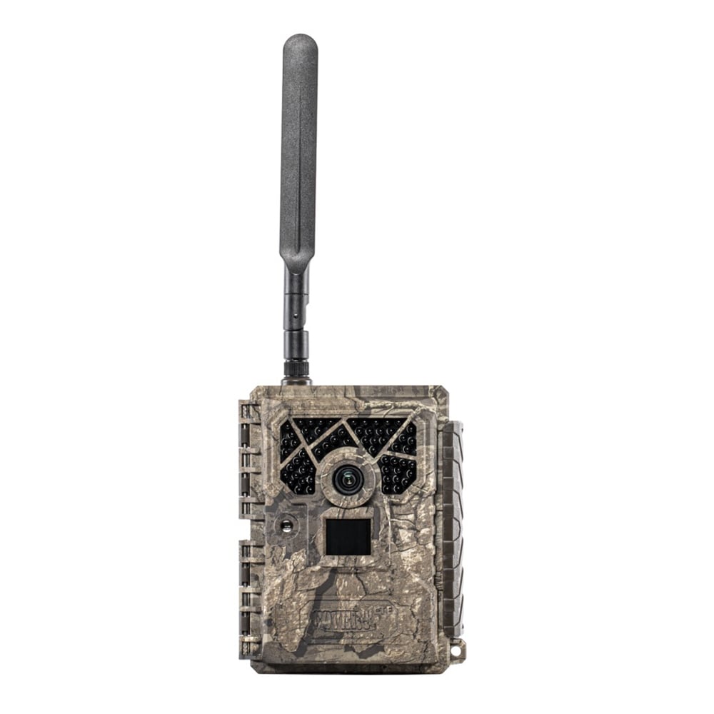 Introducing the americanlegacyfishing DLC Covert Blackhawk 20 LTE Game Camera, model 5476. It's expertly camouflaged with an antenna, lens, and sensor on the front for wildlife monitoring. The textured casing ensures seamless blending into natural surroundings for stealthy observation.