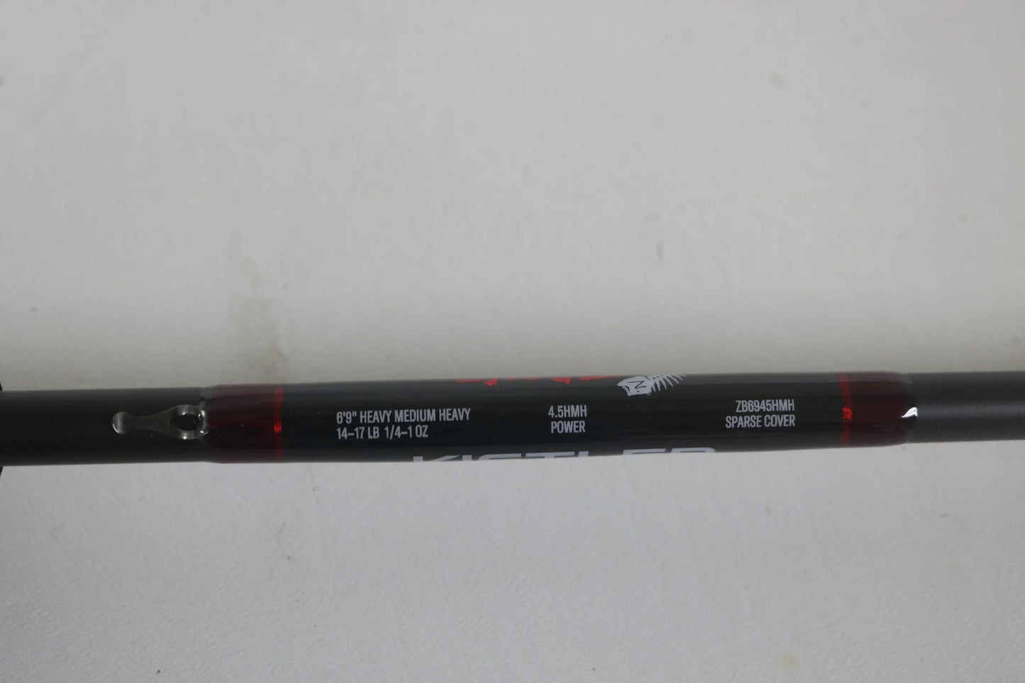 Close-up of a Kistler Z-Bone ZB6945HMH 6'9" Heavy MH used casting rod in excellent condition, featuring specs: 14-71B, 1/4-1 oz, 4.5MH power, and 28845MH/R sparse cover—great for the Rod and Reel Trade-In Program.