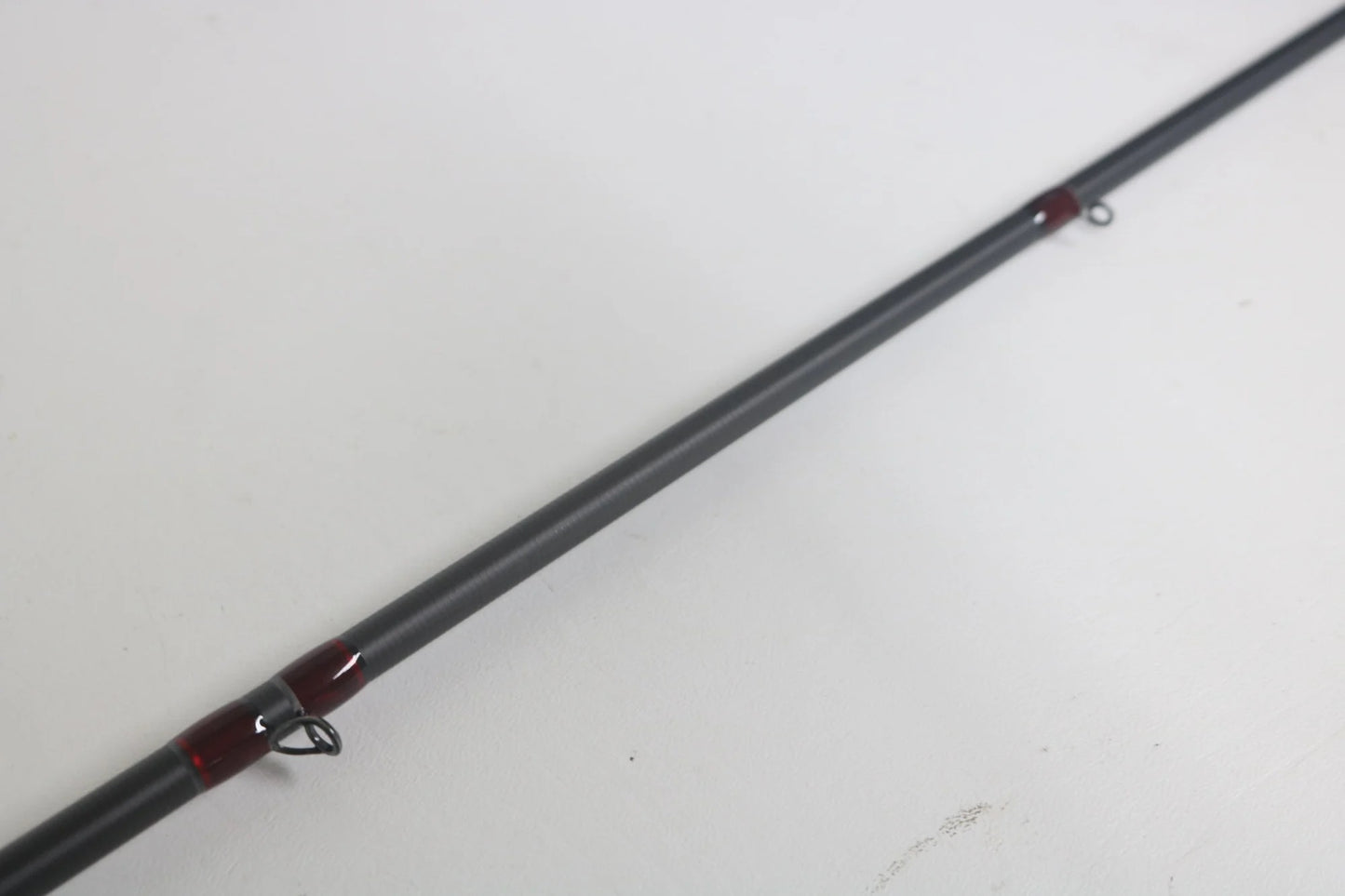 A close-up of the Kistler Z-Bone ZB6945HMH 6'9" Heavy MH Used Casting Rod in excellent condition—ideal for those planning to upgrade gear with our Rod and Reel Trade-In Program for store credit.