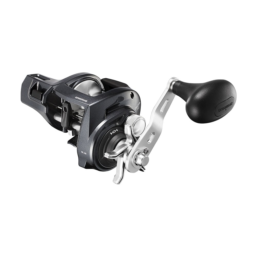 The Shimano Tekota 401HGLCA 6.6:1 Line Counter Left Hand Casting Reel features a black and silver design, ergonomic handle, and adjustment levers—ideal for trolling.