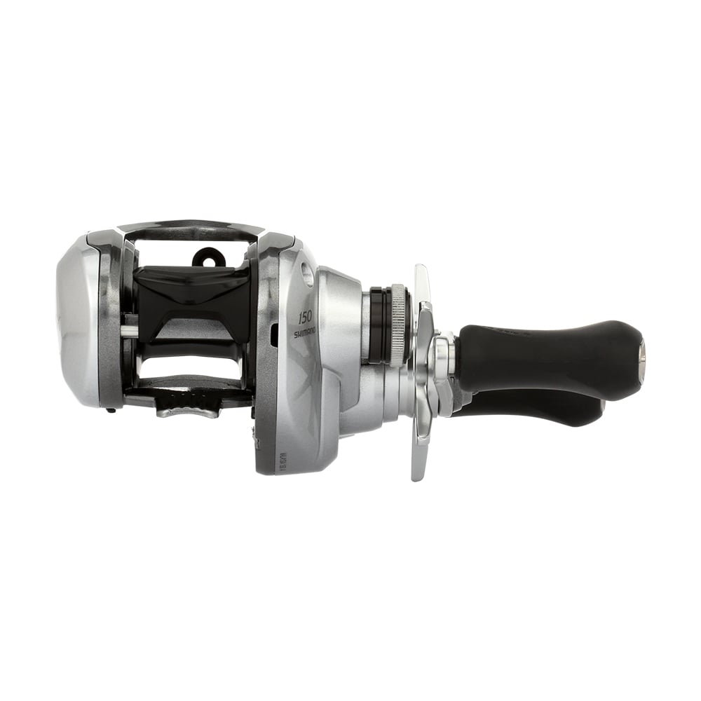 The Shimano Tranx 150A Casting Reel 6.3:1 Right Hand (TRX150A) in silver and black, featuring a double handle grip, is shown side view against a white background—ideal for saltwater fishing.