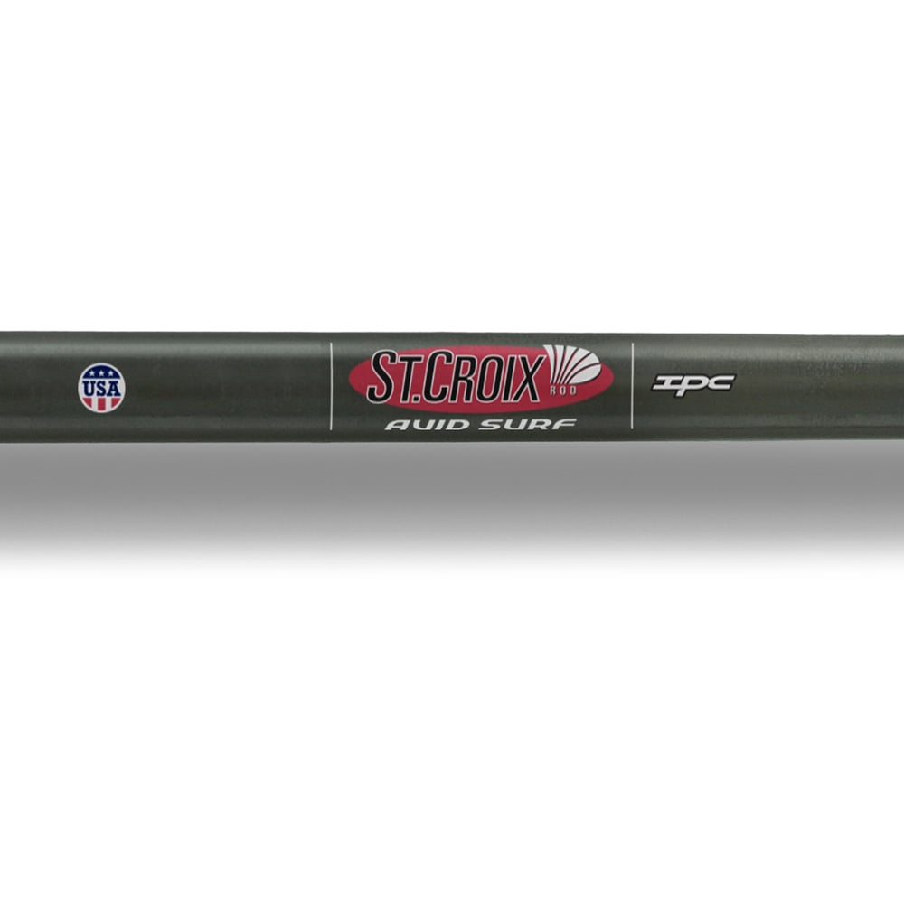 Close-up of the St. Croix Avid Surf Spinning Rod 7’0” Medium (VSS70MF) with "St. Croix Avid Surf," "IPC" logos, and a "Made in USA" badge—ideal for surf anglers seeking maximum casting distance.